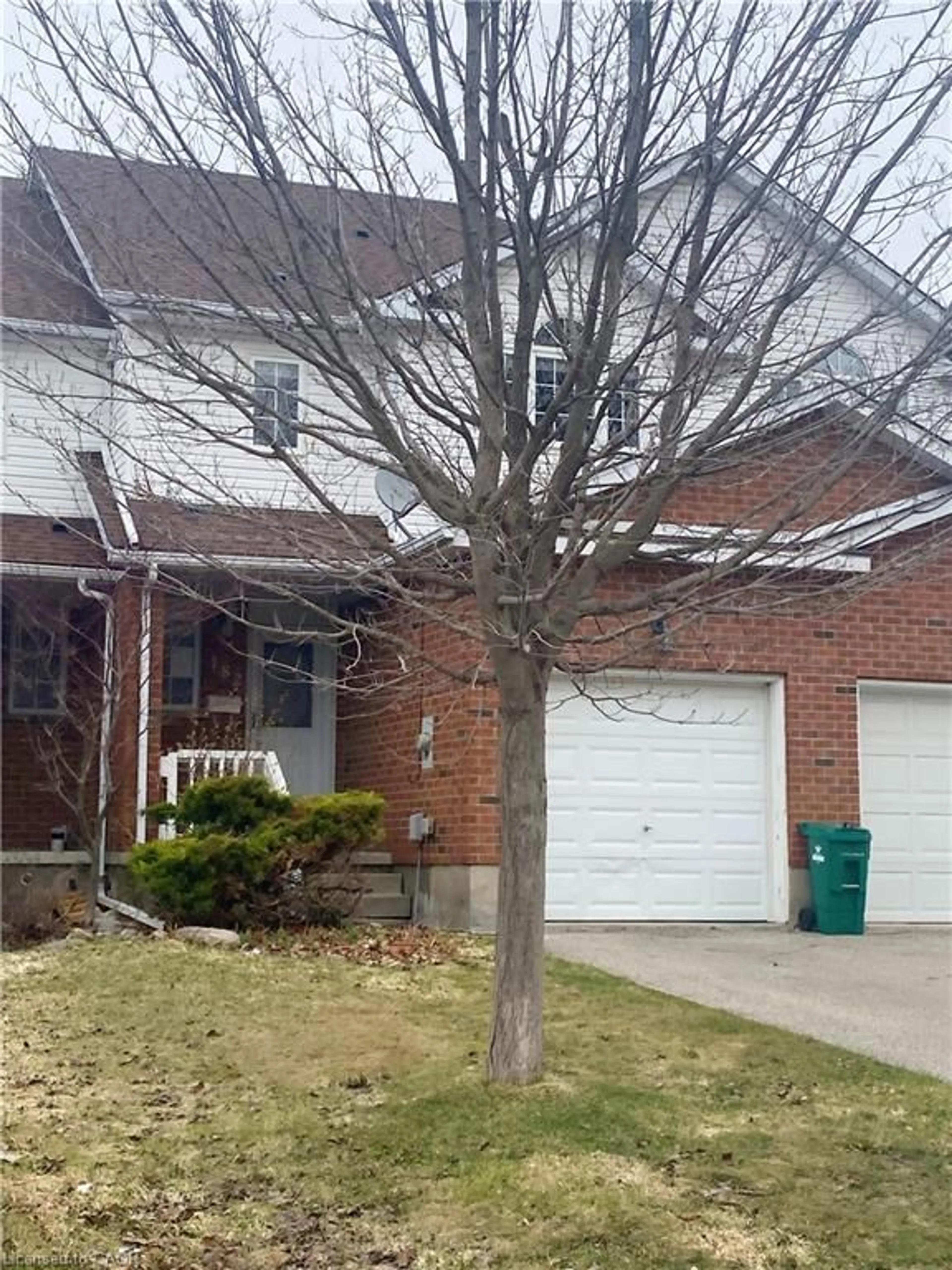 Home with brick exterior material, street for 182 Kingswood Dr, Kitchener Ontario N2E 1S9