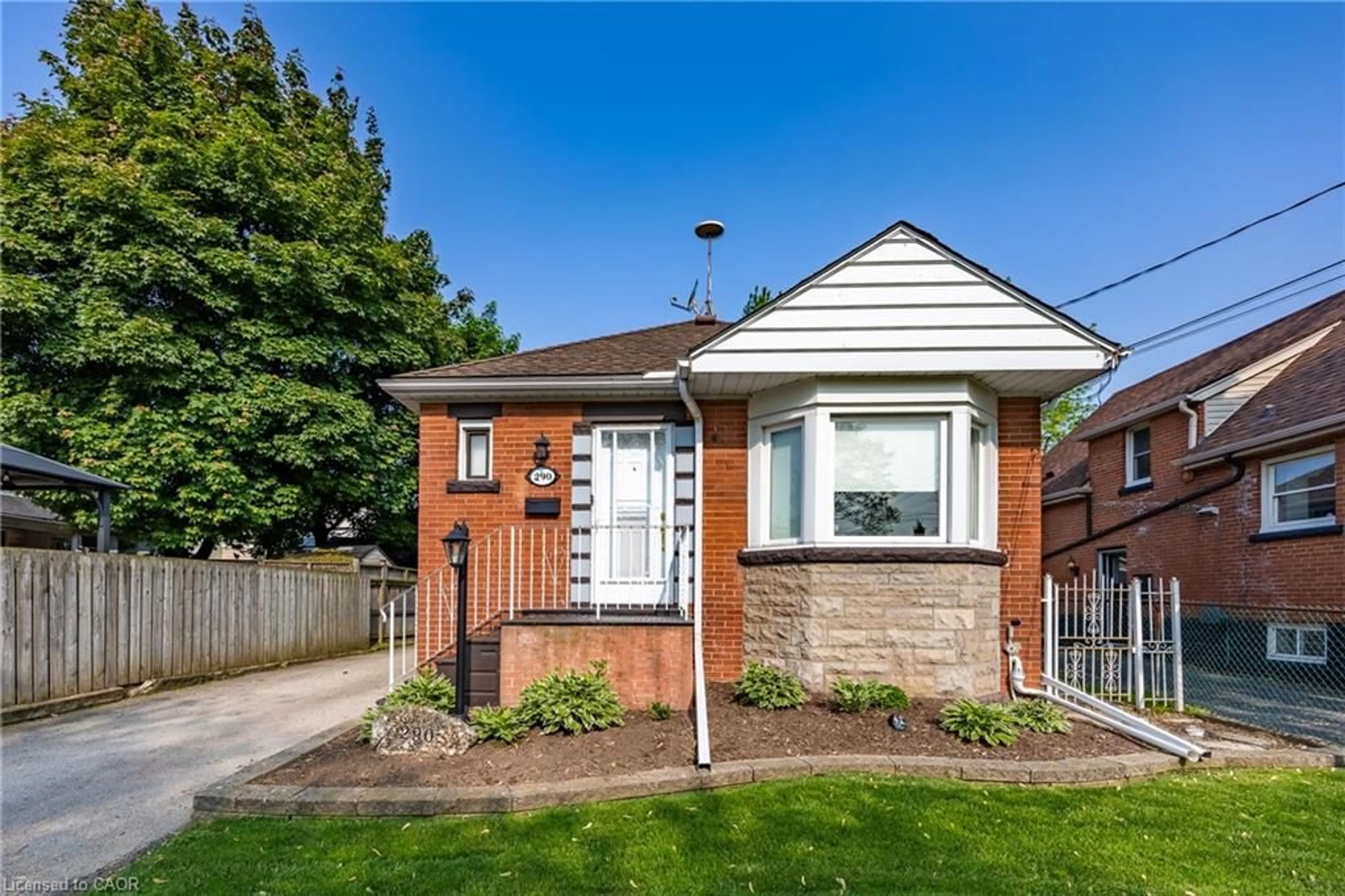 Home with brick exterior material, street for 290 East 14th St, Hamilton Ontario L9A 4B9