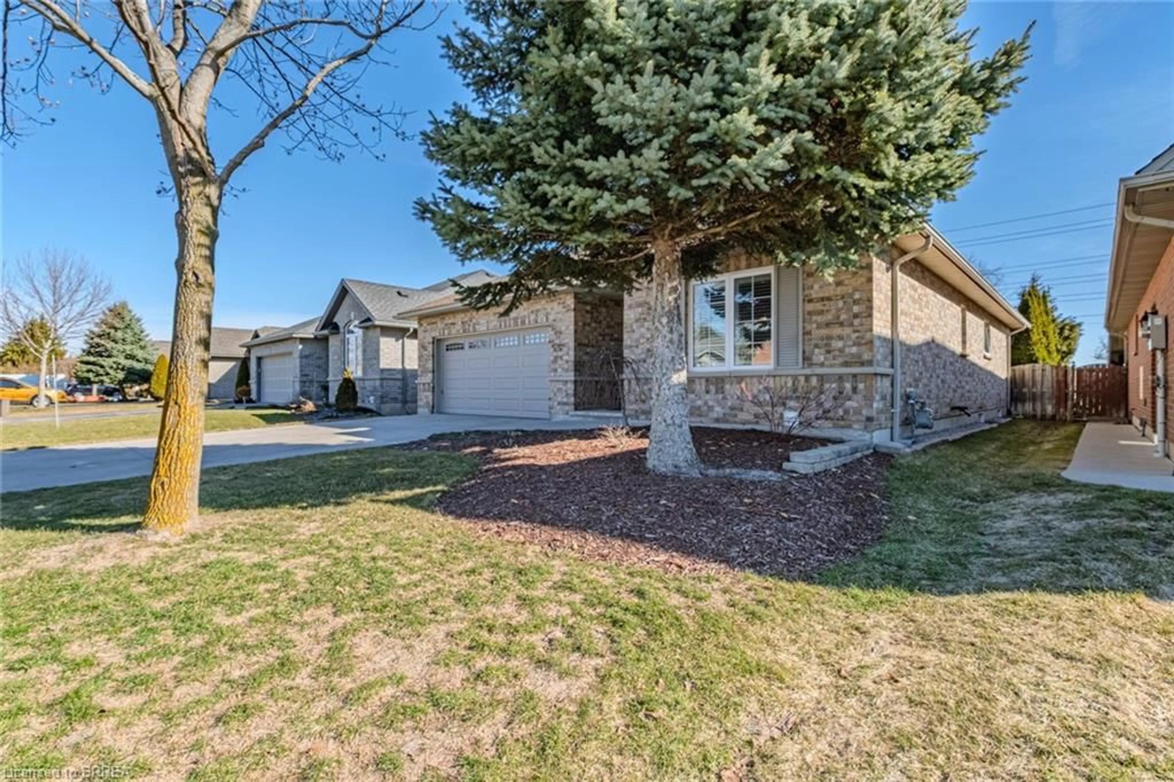 Home with brick exterior material, street for 85 Mann Ave, Simcoe Ontario N3Y 5K4