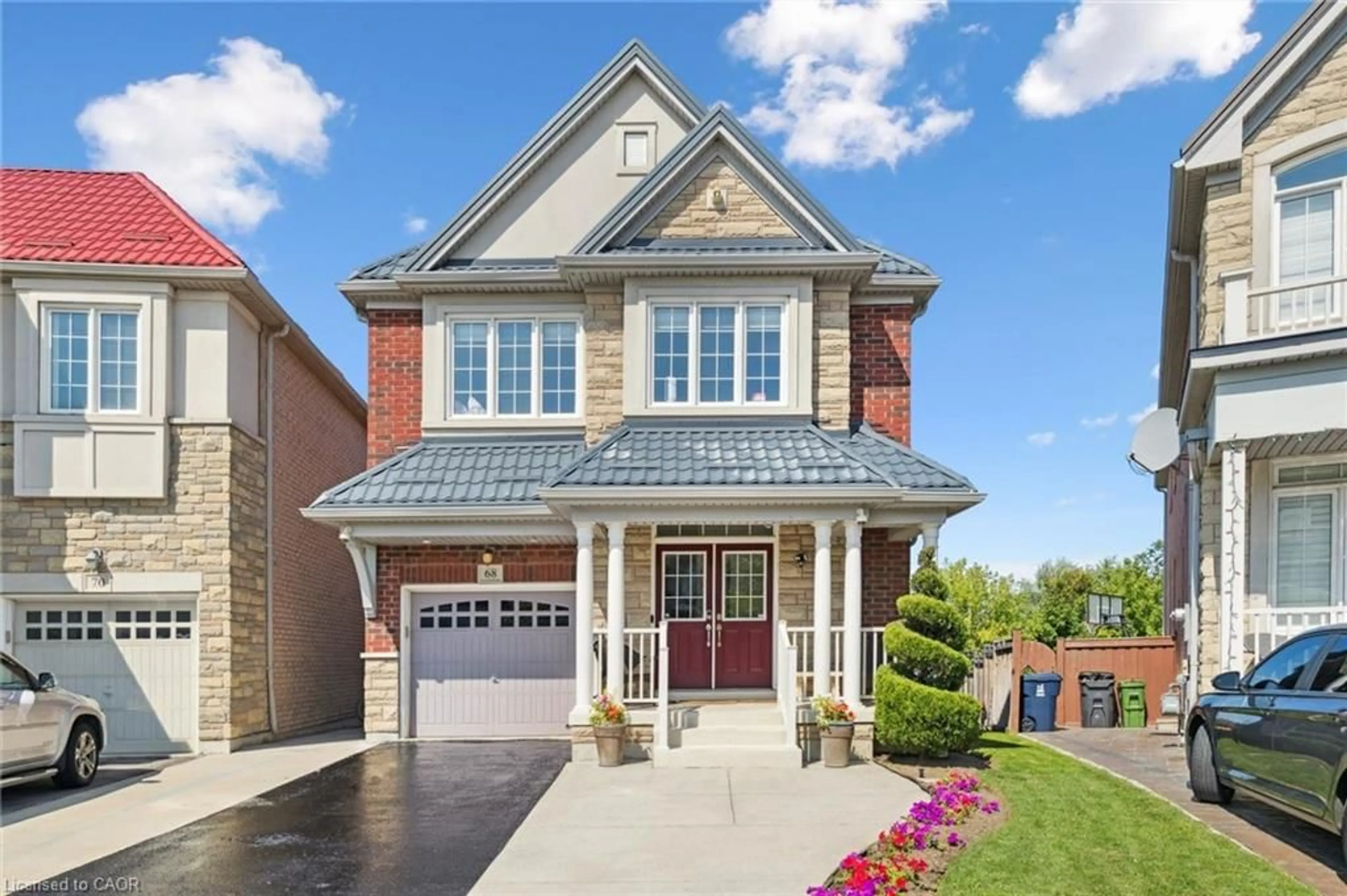 Home with brick exterior material, street for 68 Westowanis Dr, Toronto Ontario M9W 0C2