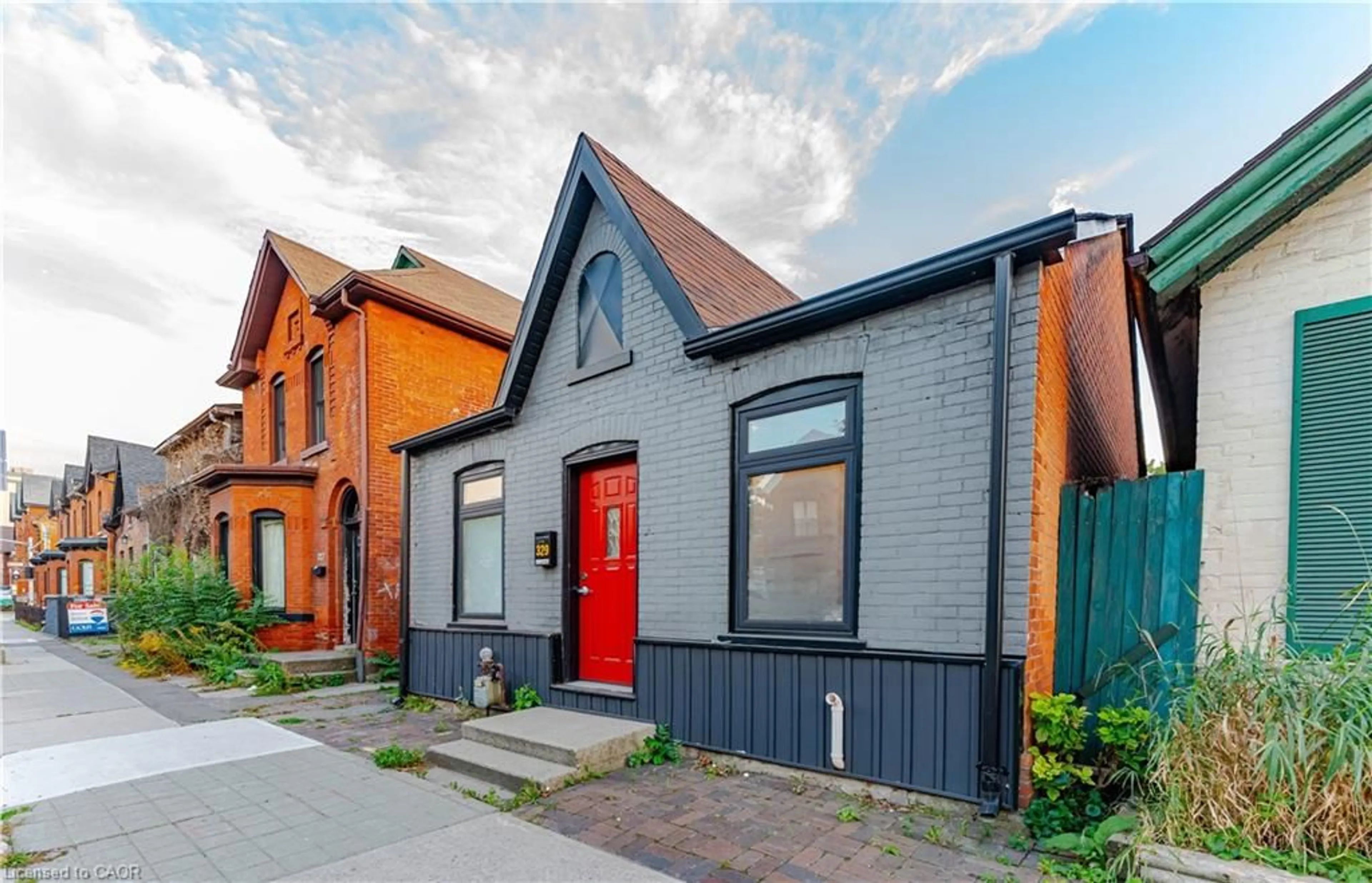 Home with brick exterior material, street for 329 Main St, Hamilton Ontario L8P 1K1