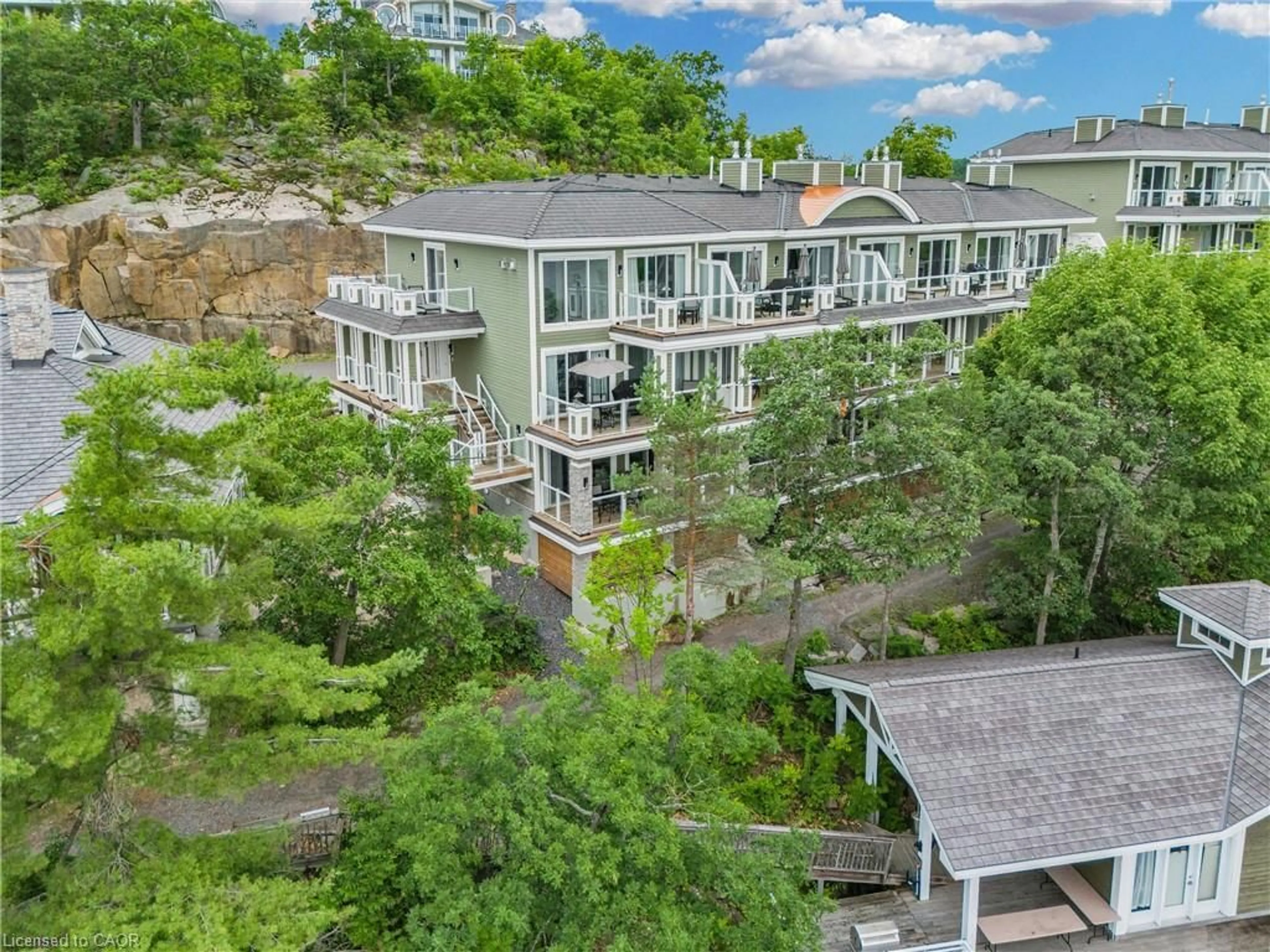 A pic from outside/outdoor area/front of a property/back of a property/a pic from drone, city buildings view from balcony for 1869 Muskoka 118 Rd #BTW-101, Bracebridge Ontario P1L 1W8