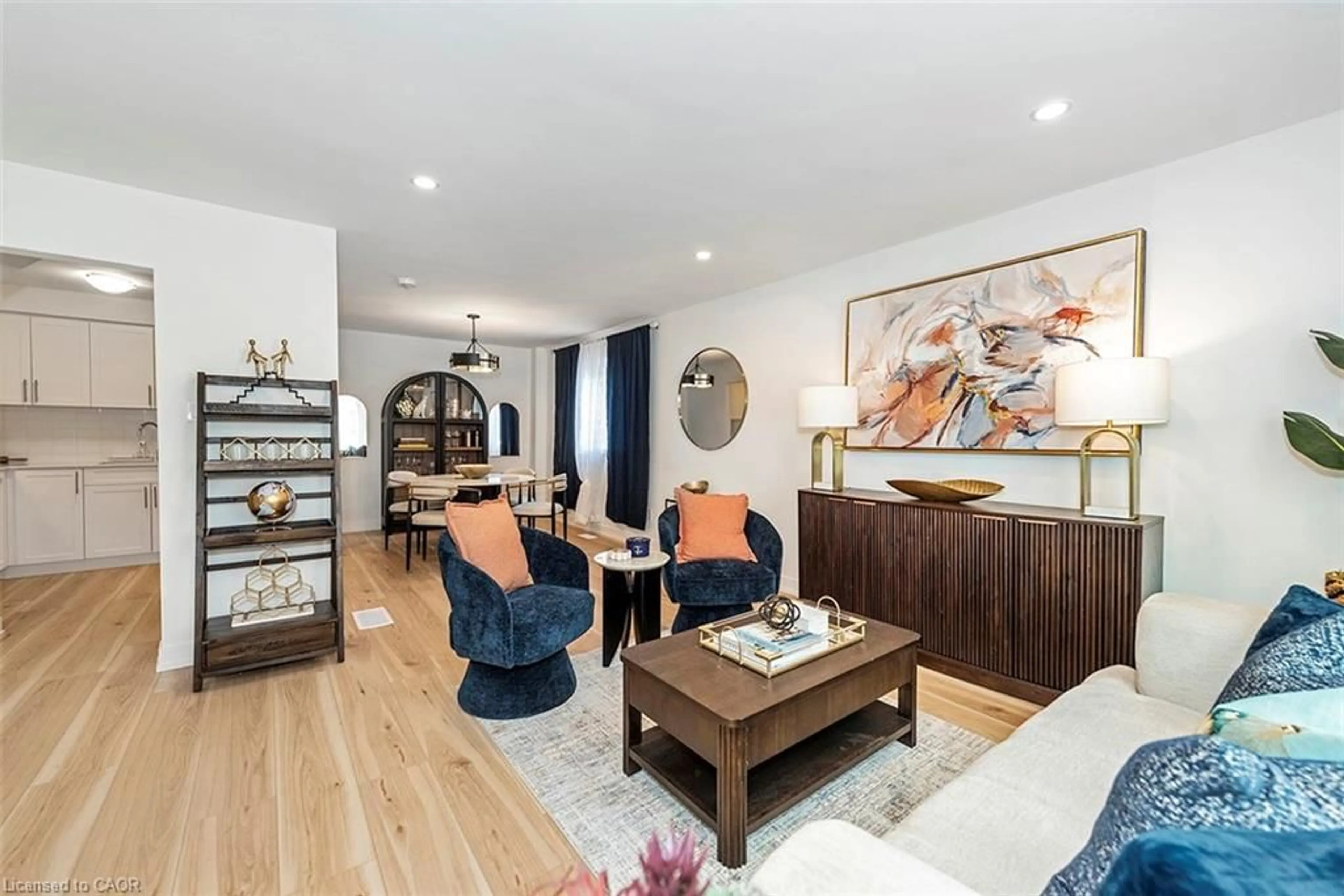 Living room with furniture, wood/laminate floor for 56 & 58 Delawana Dr, Hamilton Ontario L8E 1G4