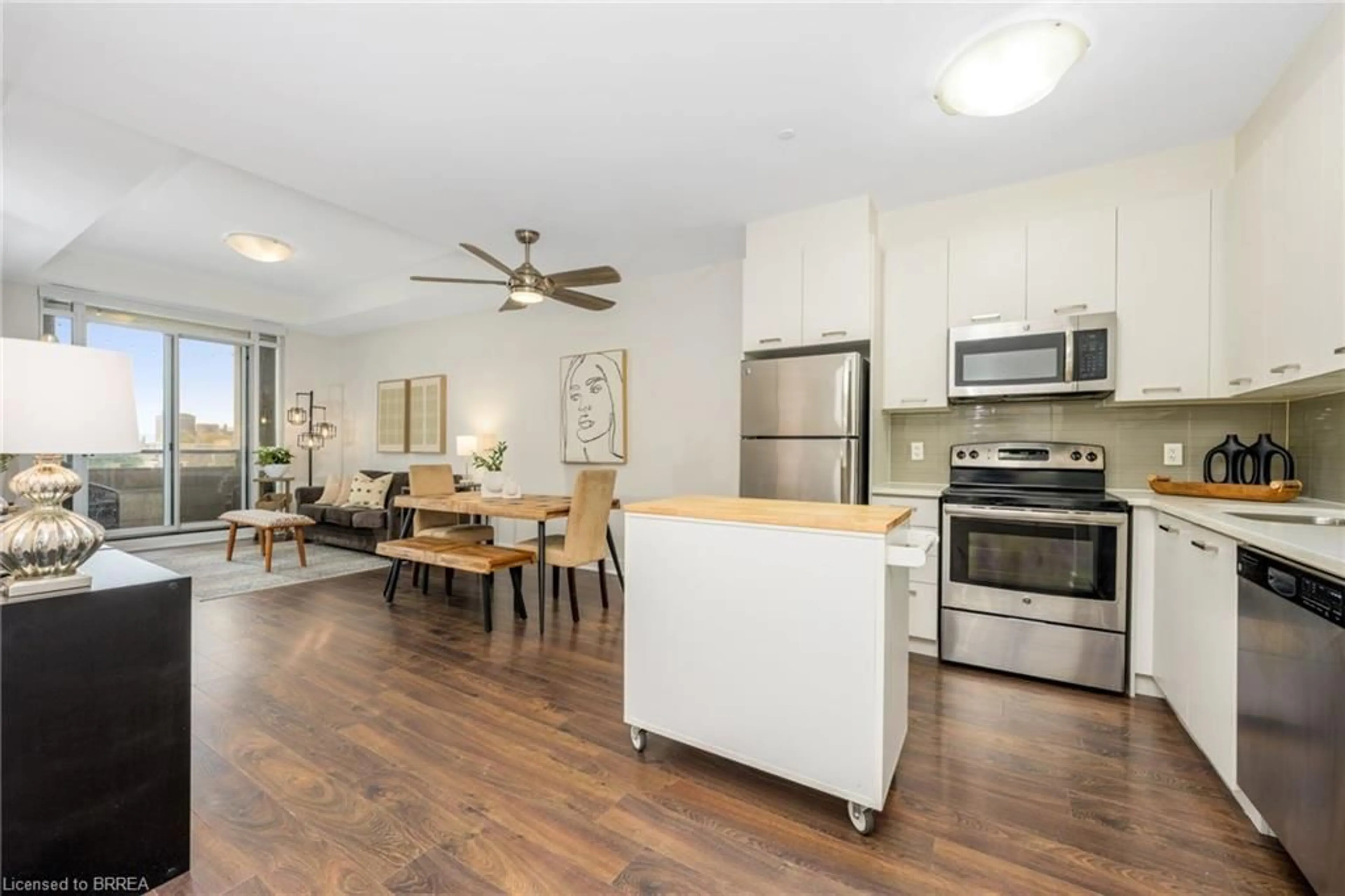 Open concept kitchen, wood/laminate floor for 150 Main St #505, Hamilton Ontario L8P 1H8