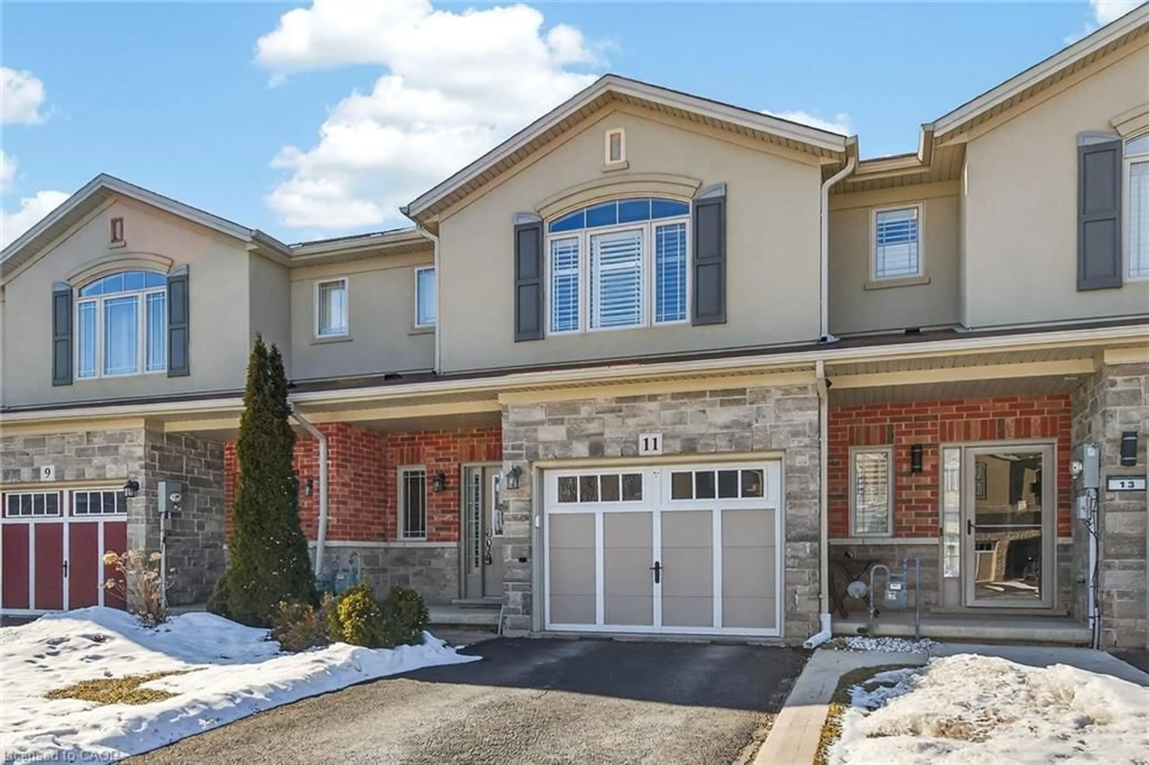 Home with brick exterior material, street for 11 Hitching Post Ridge, Binbrook Ontario L0R 1C0