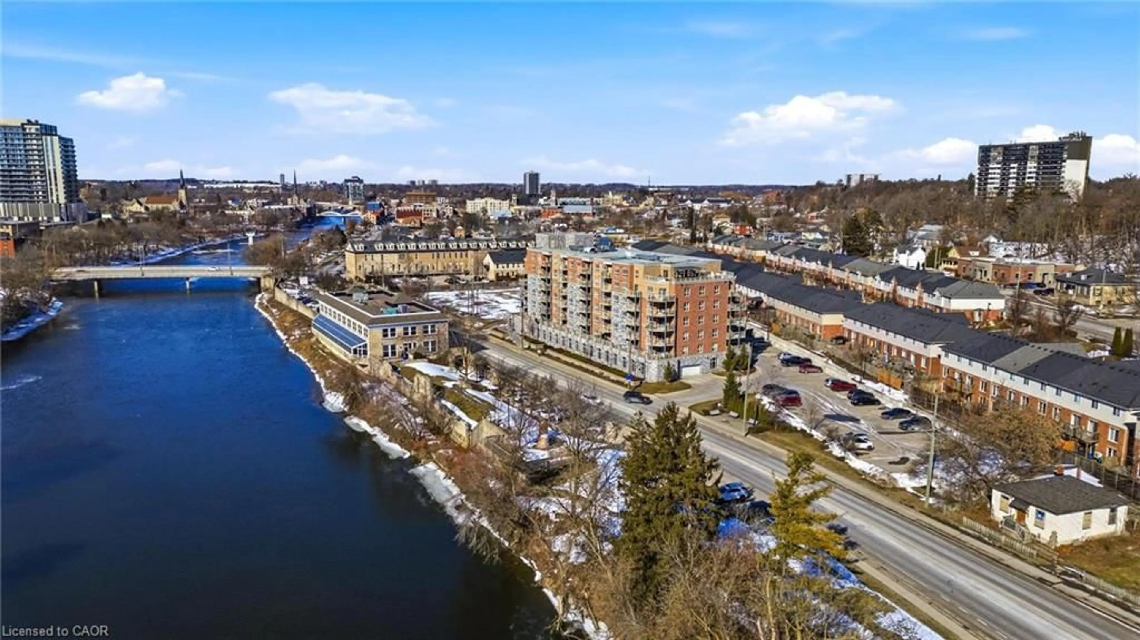 A pic from outside/outdoor area/front of a property/back of a property/a pic from drone, water/lake/river/ocean view for 155 Water St #306, Cambridge Ontario N1R 3E3