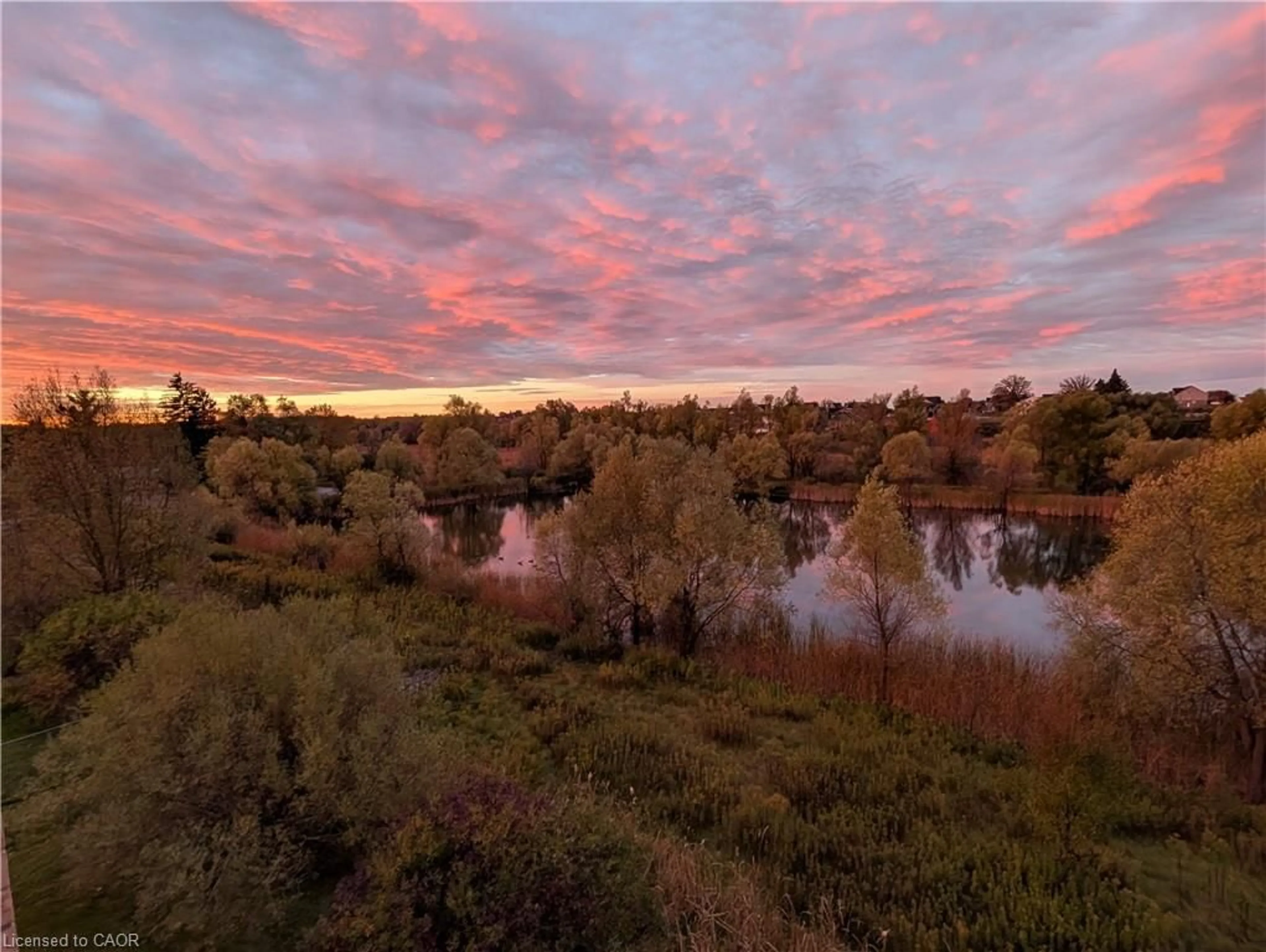 A pic from outside/outdoor area/front of a property/back of a property/a pic from drone, water/lake/river/ocean view for 1077 Gordon St #333, Guelph Ontario N1G 0E3