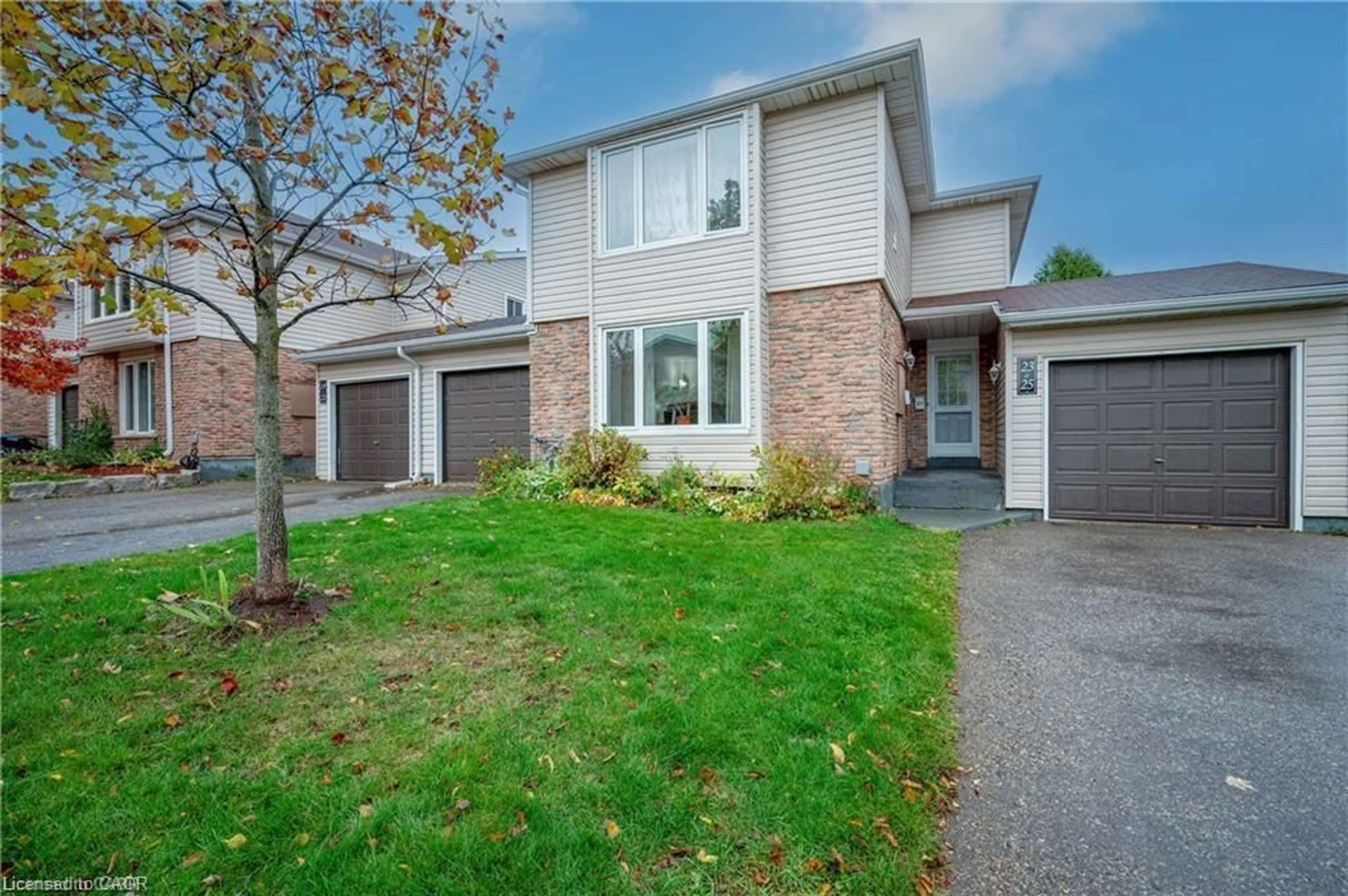 Home with brick exterior material, street for 169 Elm Ridge Dr #25, Kitchener Ontario N2N 1L7