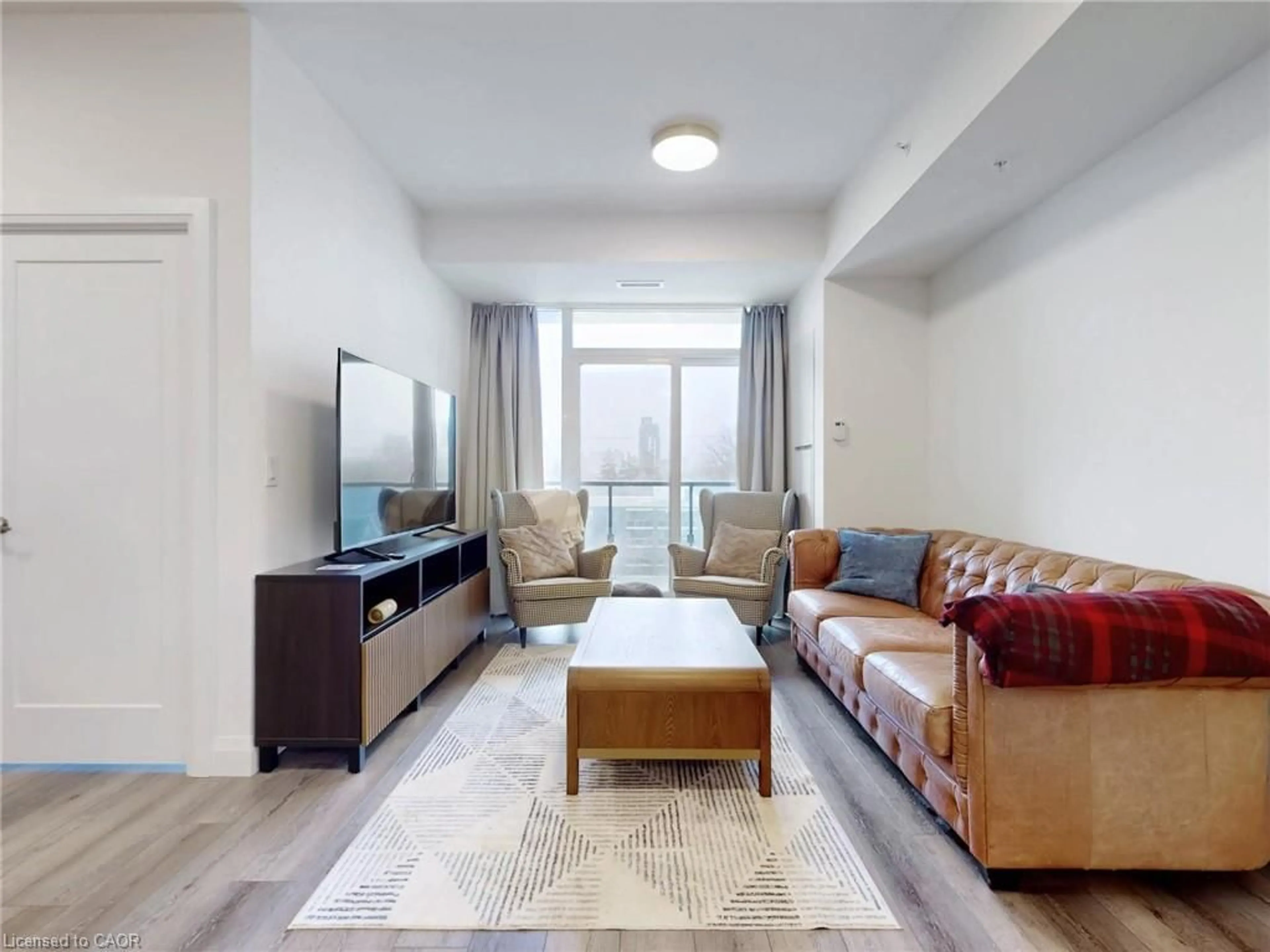 Living room with furniture, unknown for 500 Brock Ave #604, Burlington Ontario L7S 0A5