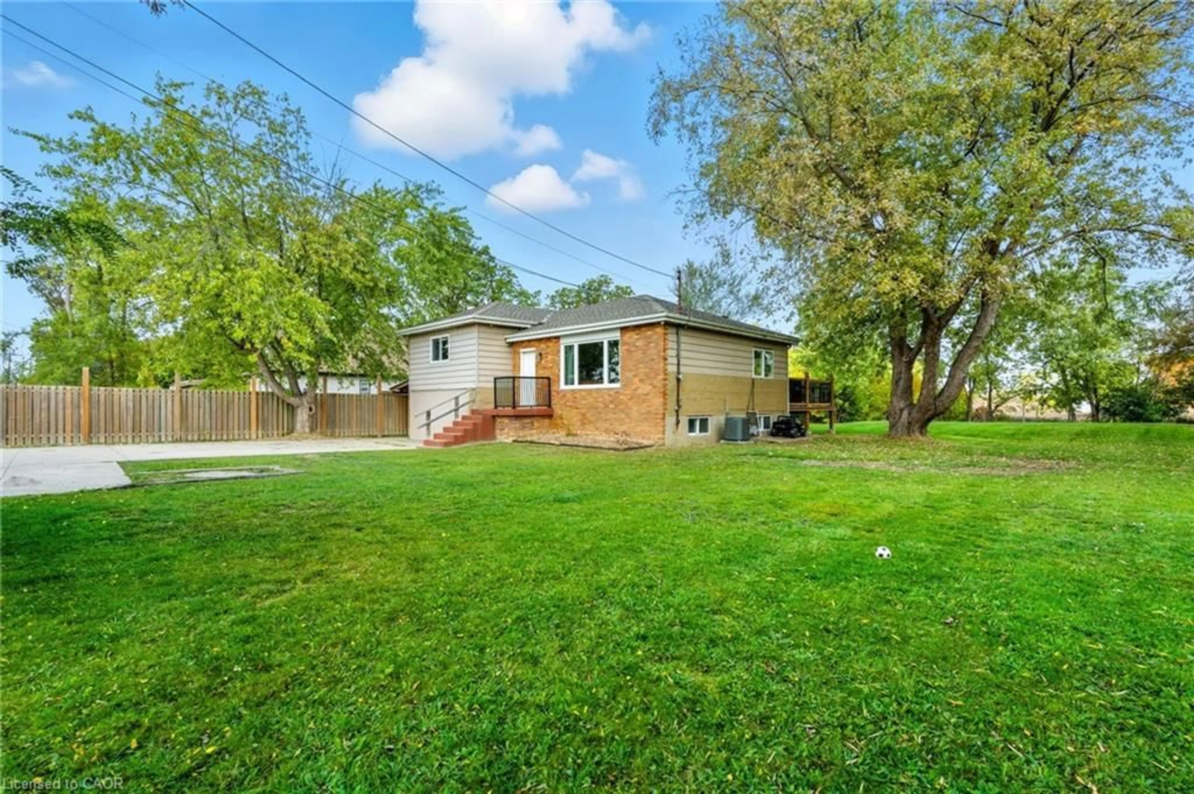 A pic from outside/outdoor area/front of a property/back of a property/a pic from drone, street for 293 #20 Regional Rd, Stoney Creek Ontario L8J 3H4