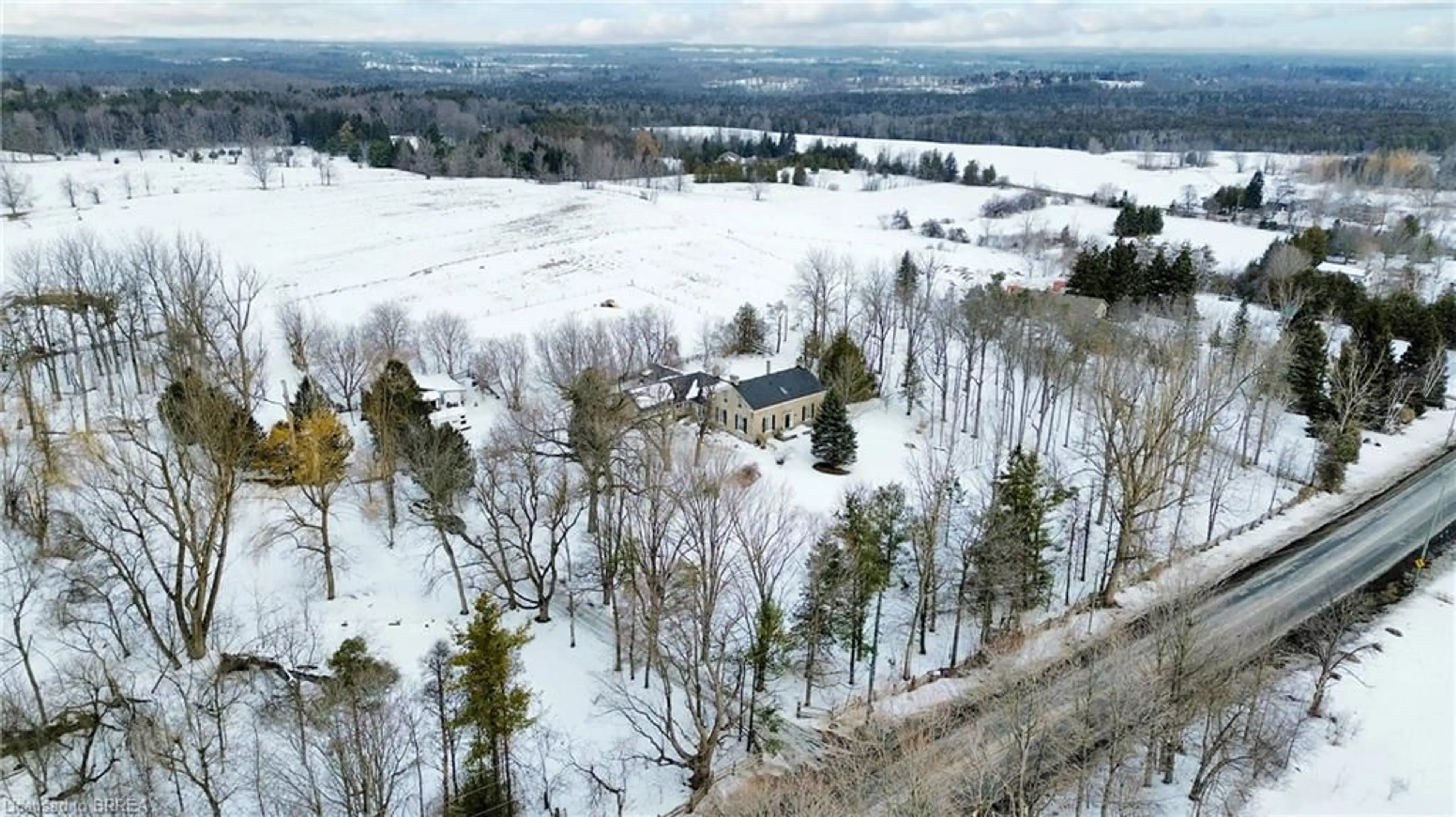 A pic from outside/outdoor area/front of a property/back of a property/a pic from drone, forest/trees view for 5595 25 Side Road, Milton Ontario L7J 2L7