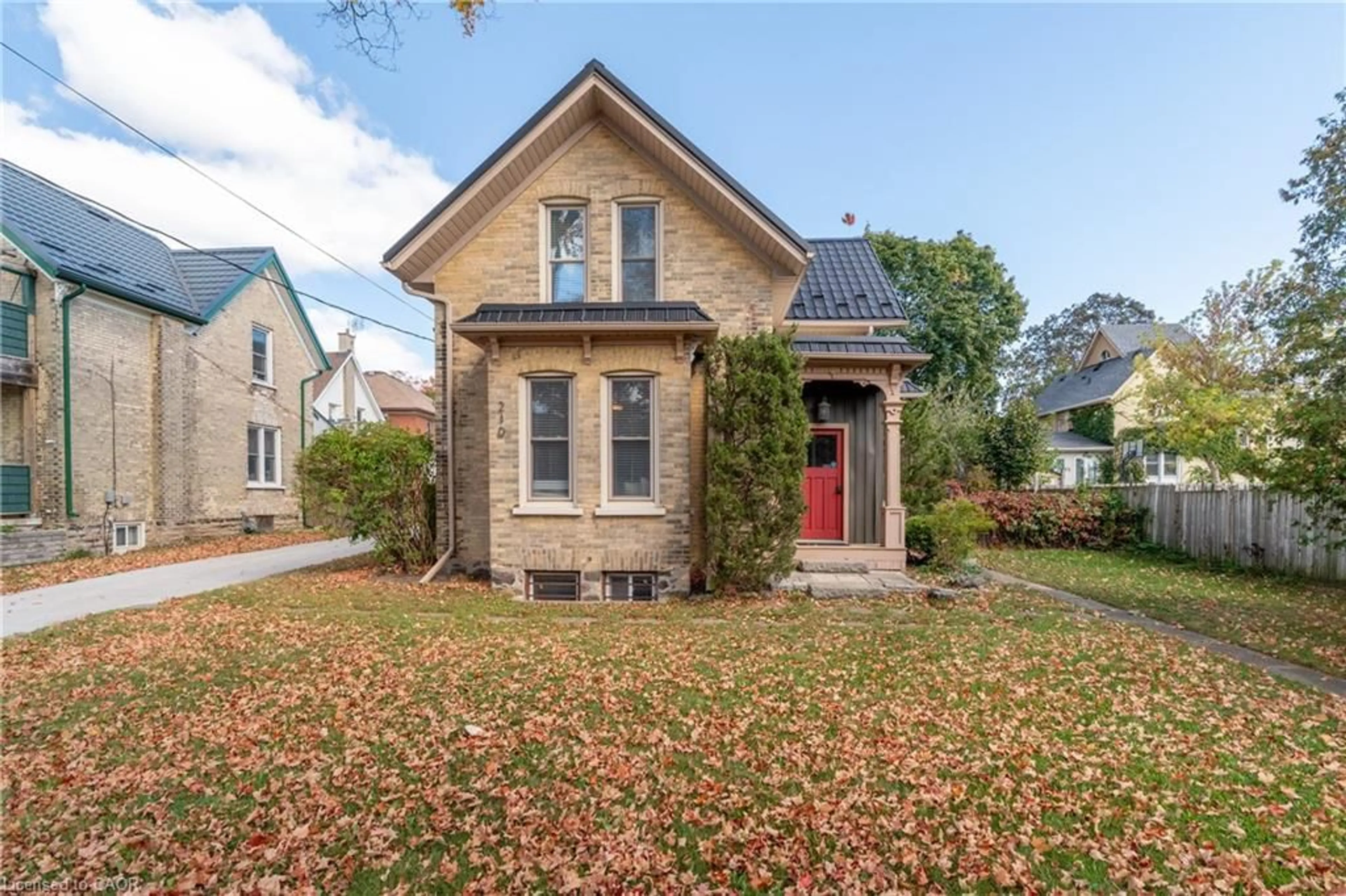 Home with brick exterior material, street for 210 Lancaster St, Kitchener Ontario N2H 1N6