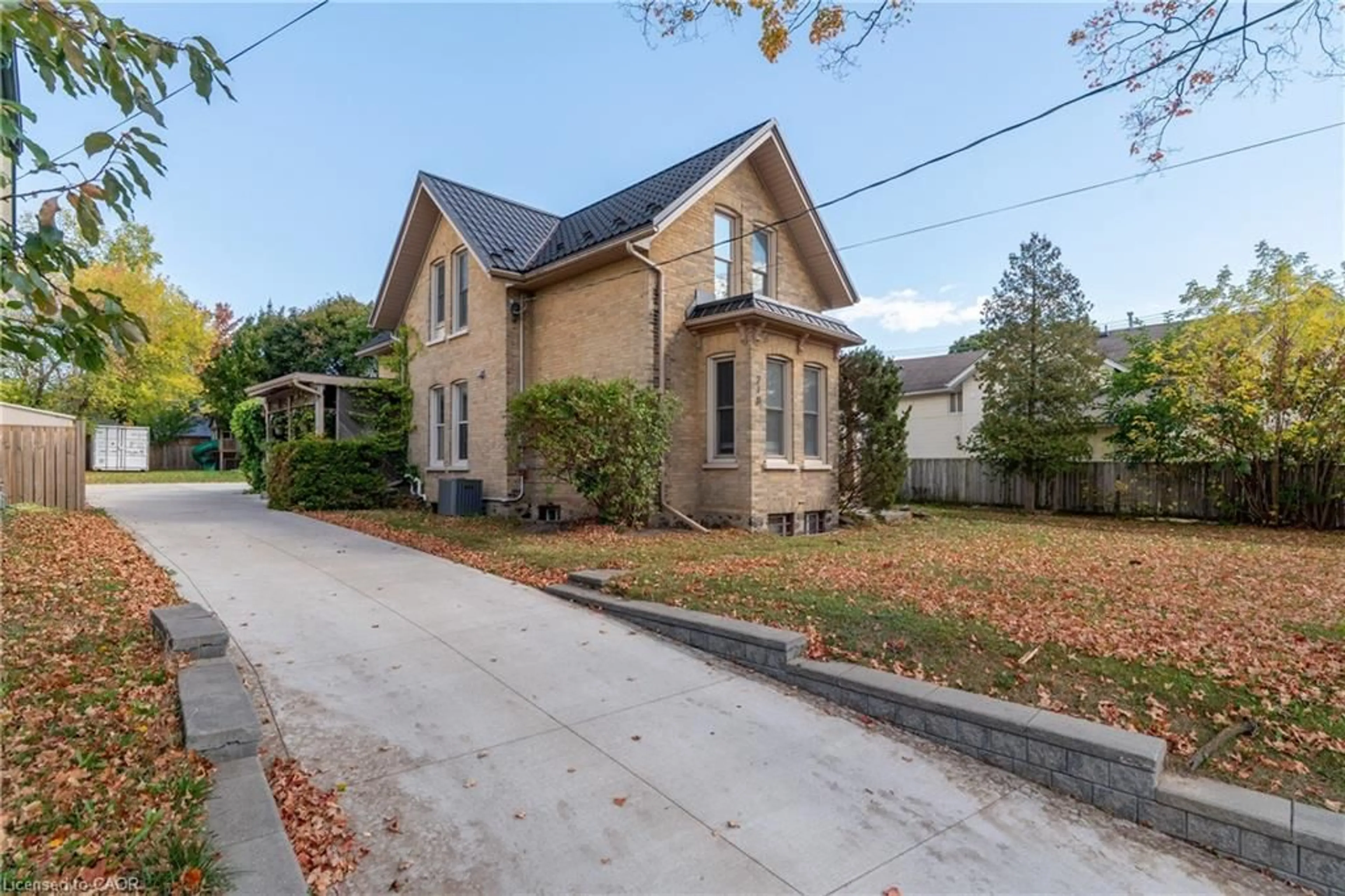 Home with brick exterior material, street for 210 Lancaster St, Kitchener Ontario N2H 1N6
