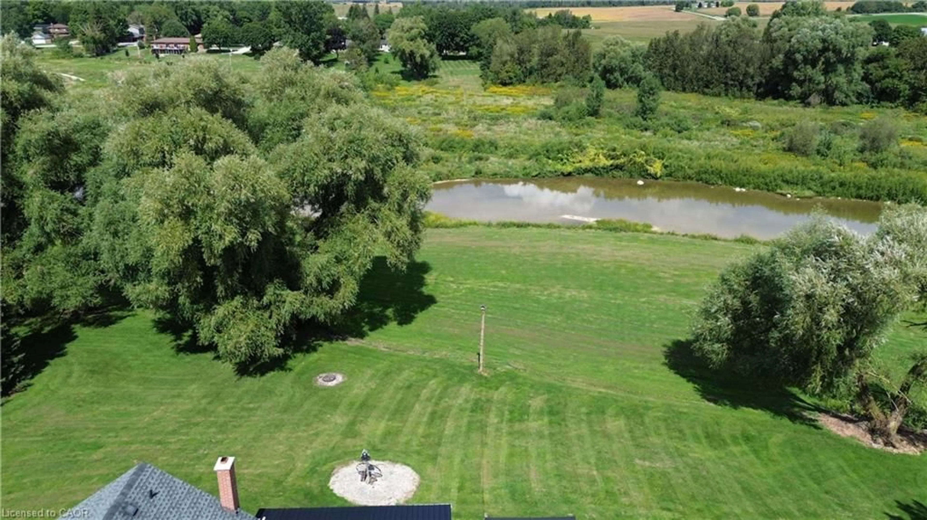 A pic from outside/outdoor area/front of a property/back of a property/a pic from drone, water/lake/river/ocean view for 2081 John St, Howick Ontario N0G 1X0