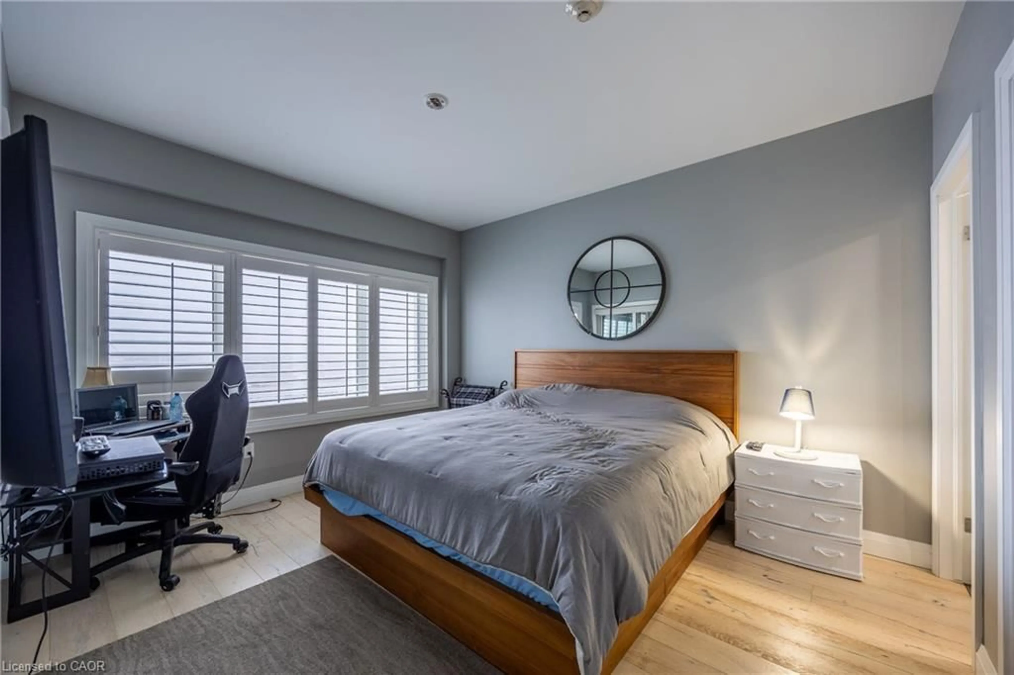 Bedroom with bed, wood/laminate floor for 12 Erie Blvd #208, Long Point Ontario N0E 1M0