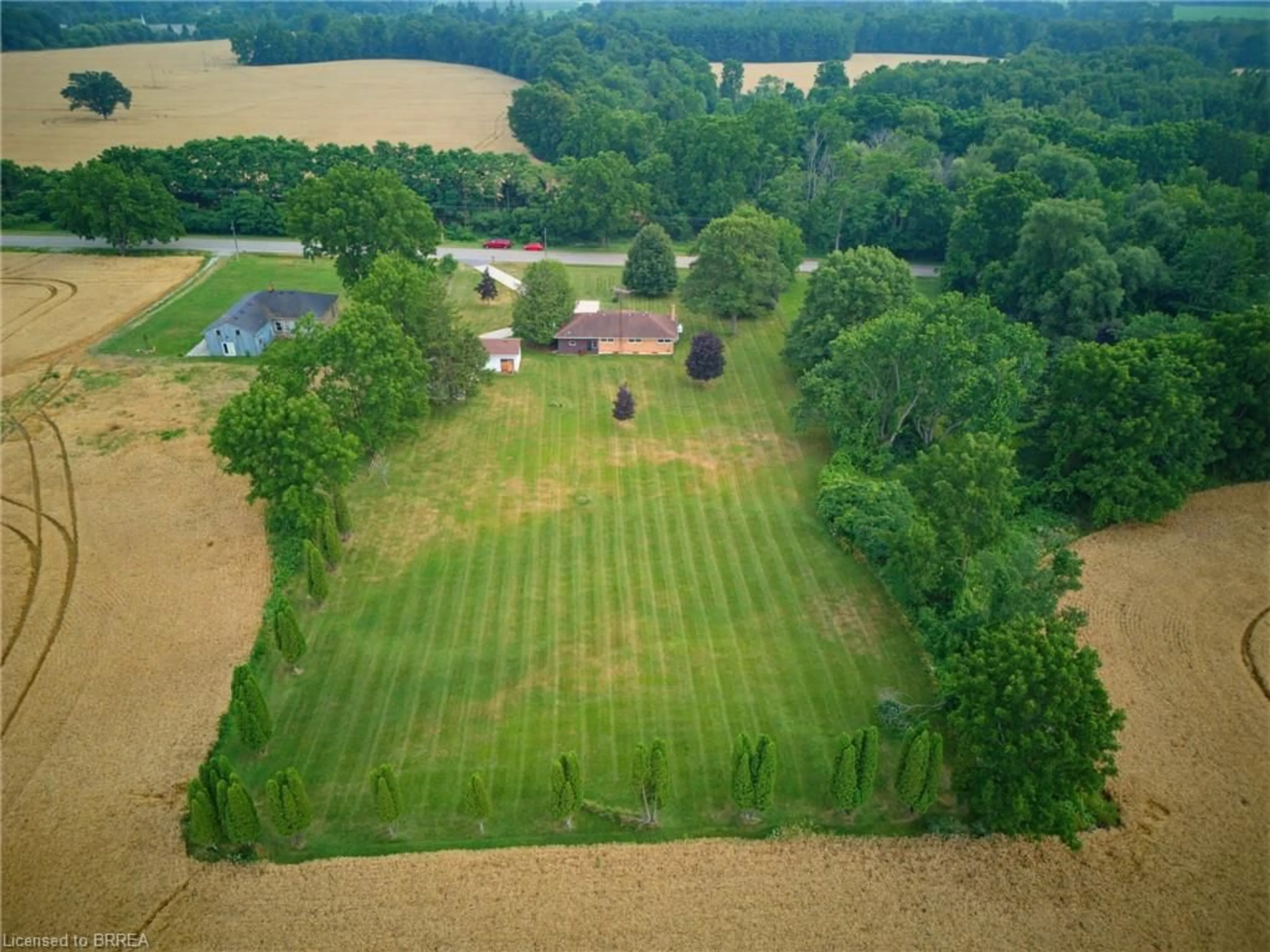 A pic from outside/outdoor area/front of a property/back of a property/a pic from drone, forest/trees view for 347 Blue Lake Rd, South Dumfries Ontario N0E 1N0