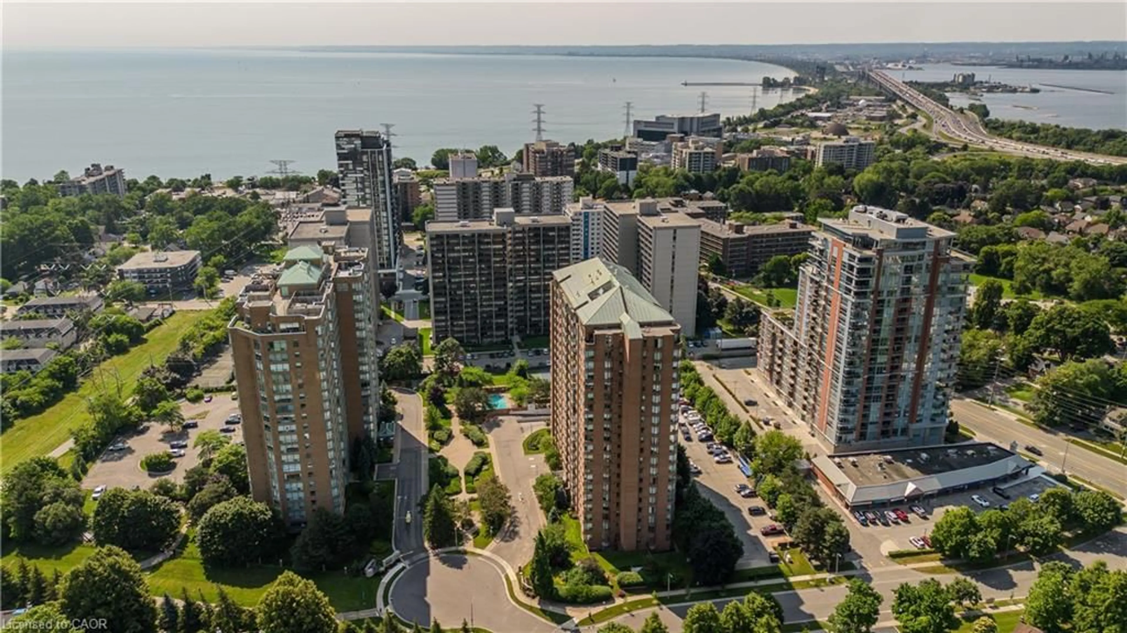 A pic from outside/outdoor area/front of a property/back of a property/a pic from drone, city buildings view from balcony for 1276 Maple Crossing Blvd #511, Burlington Ontario L7S 2J9