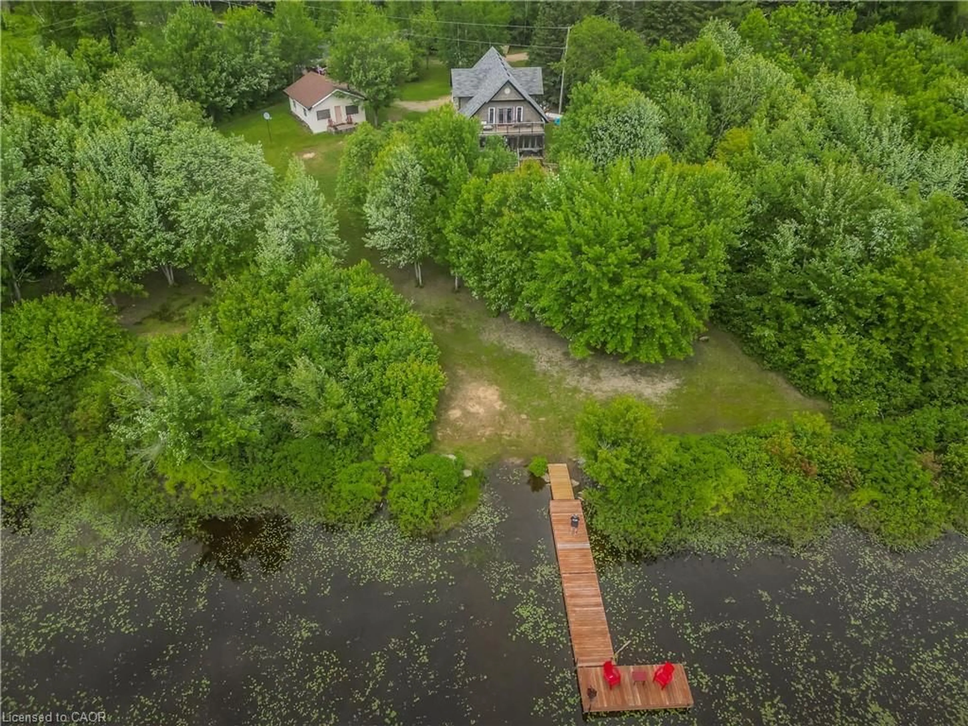 A pic from outside/outdoor area/front of a property/back of a property/a pic from drone, water/lake/river/ocean view for 5 Bridge Rd, Magnetawan Ontario P0A 1P0