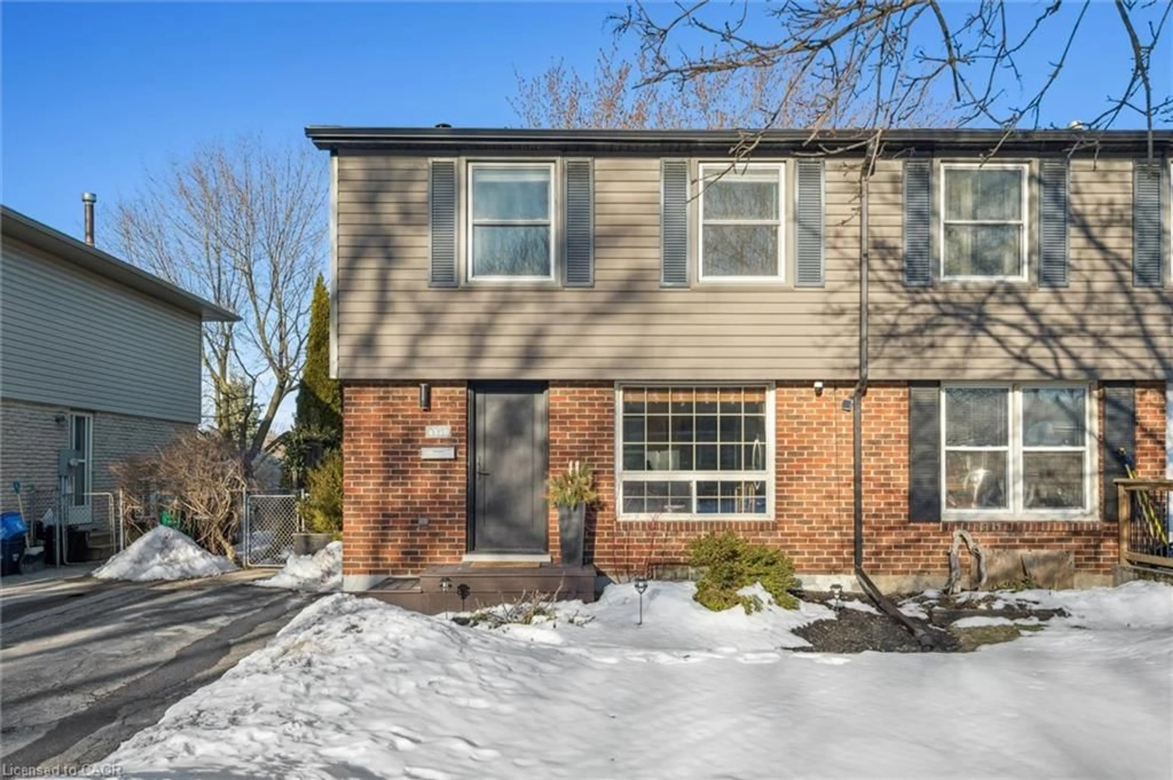 Home with brick exterior material, street for 434B Dunvegan Dr, Waterloo Ontario N2K 2C7