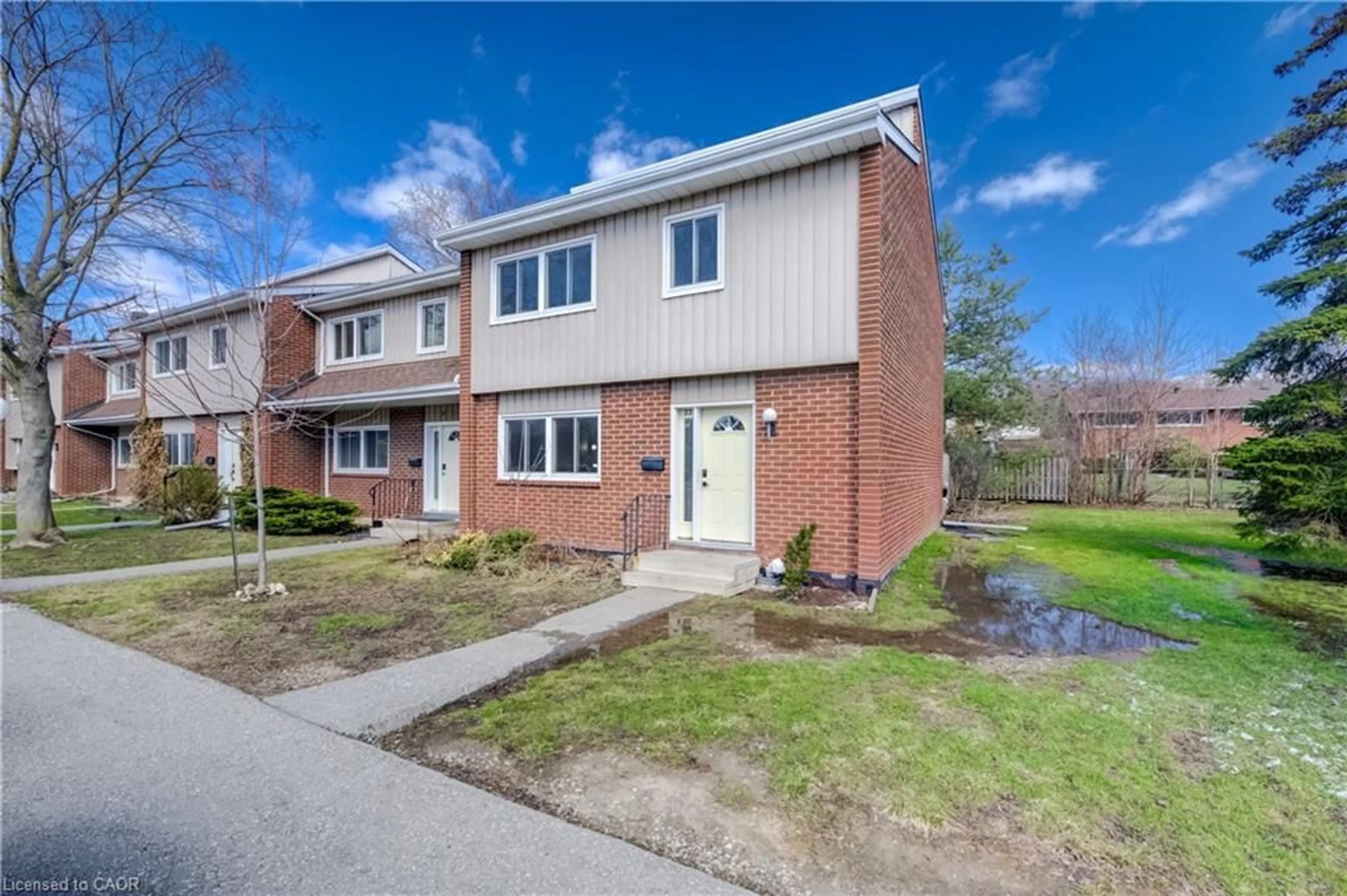 Home with brick exterior material, street for 121 University Ave #22, Waterloo Ontario N2J 2W1