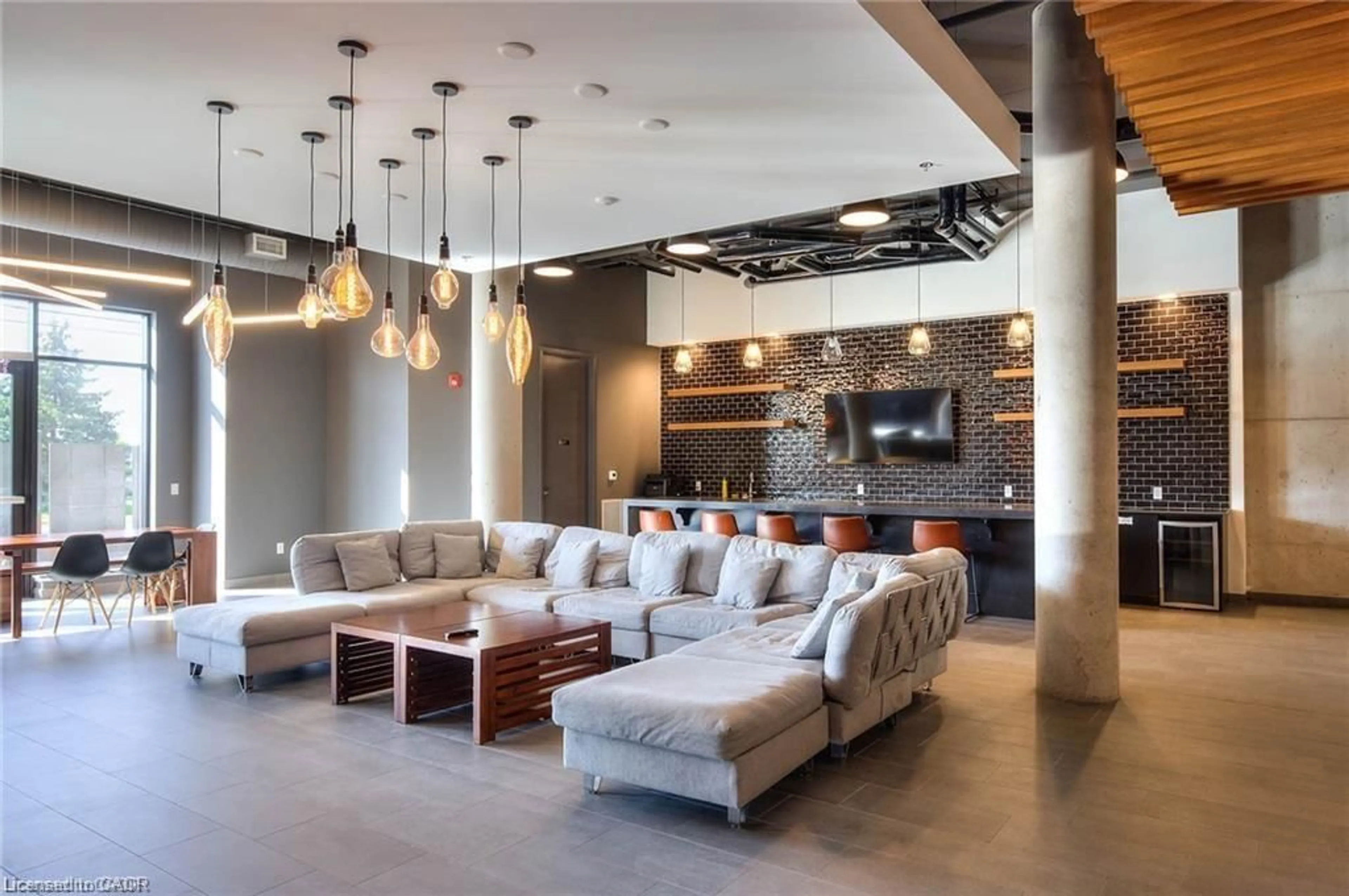 Living room with furniture, cement floor for 251 Northfield Dr #510, Waterloo Ontario N2K 0G9