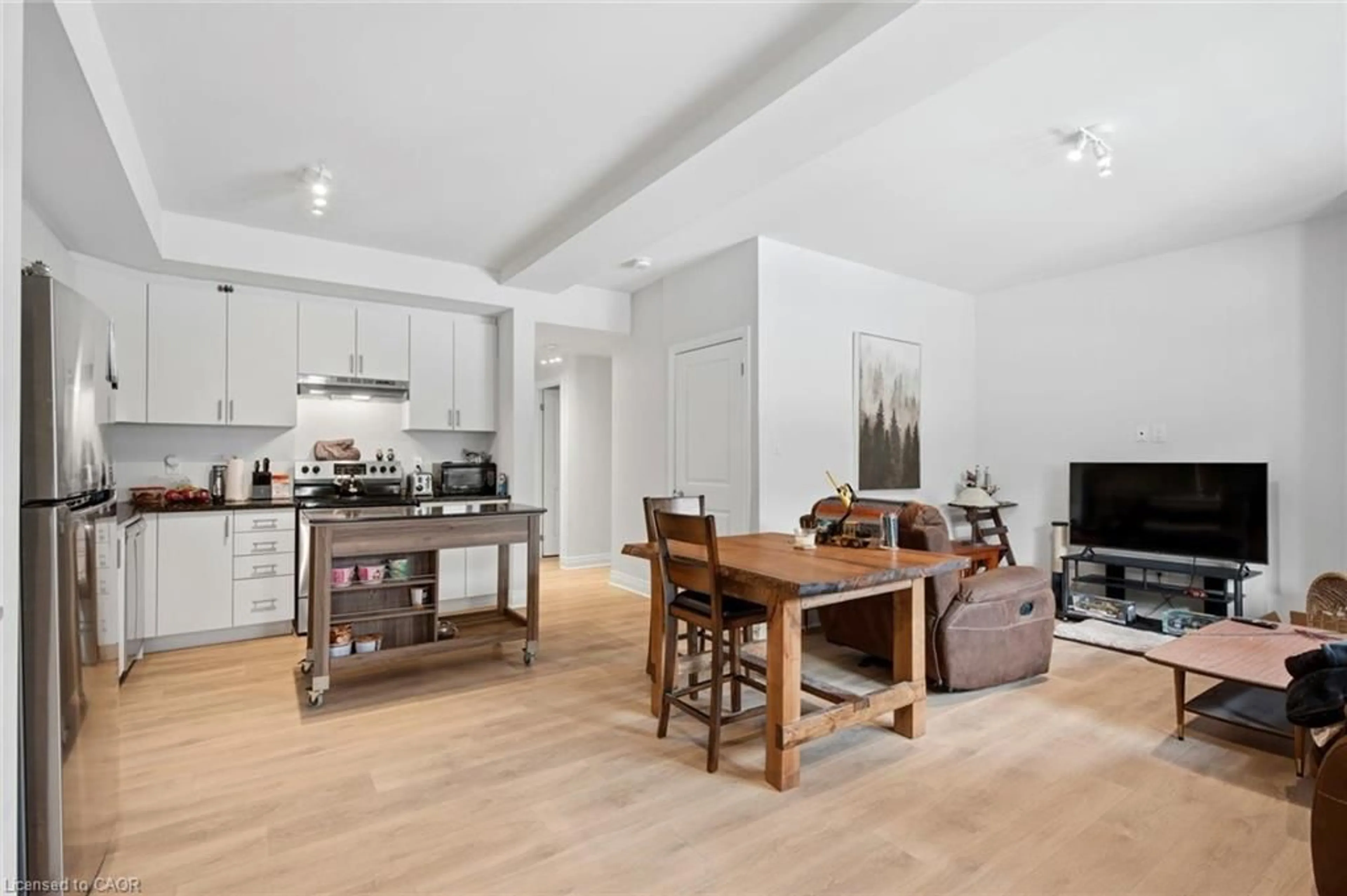 Open concept kitchen, wood/laminate floor for 2 Willow St #71, Paris Ontario N3L 0K7