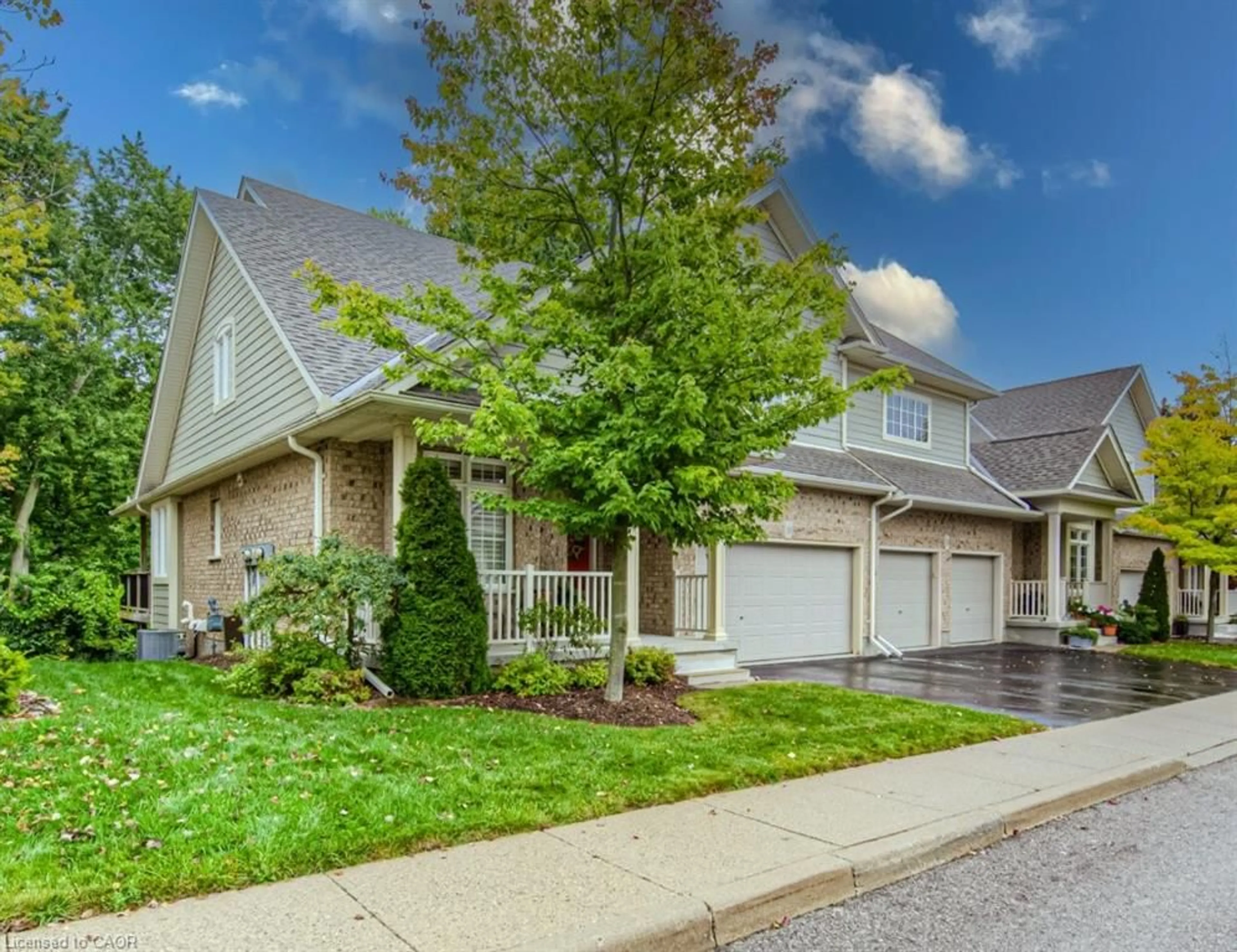 Home with vinyl exterior material, street for 50 Bryan Crt #31, Kitchener Ontario N2A 4N4