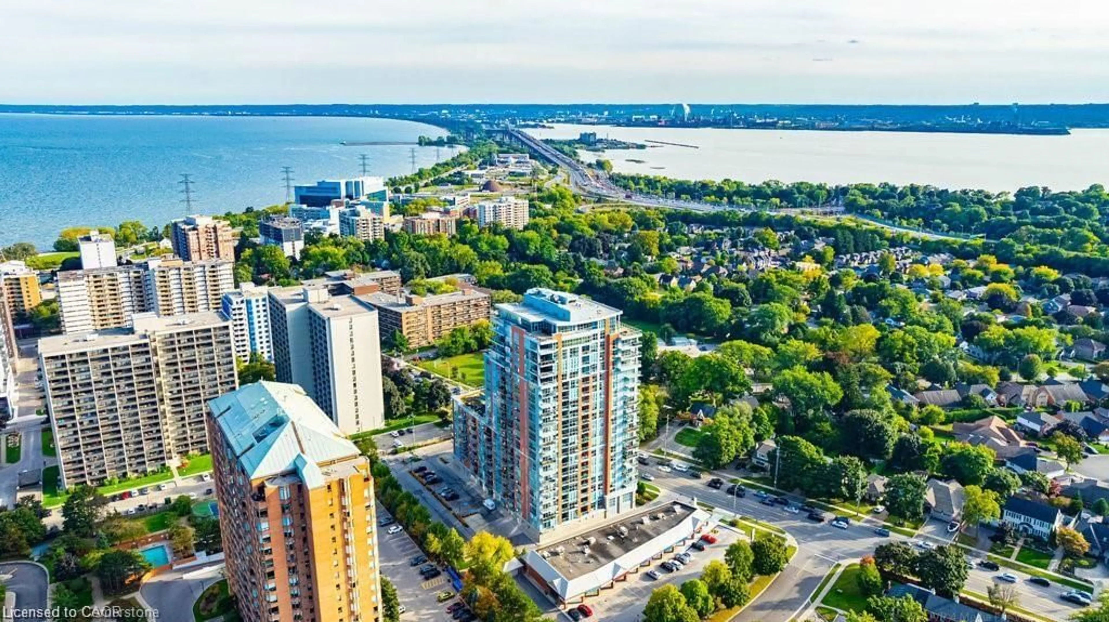 A pic from outside/outdoor area/front of a property/back of a property/a pic from drone, water/lake/river/ocean view for 551 Maple Ave #607, Burlington Ontario L7S 1M7