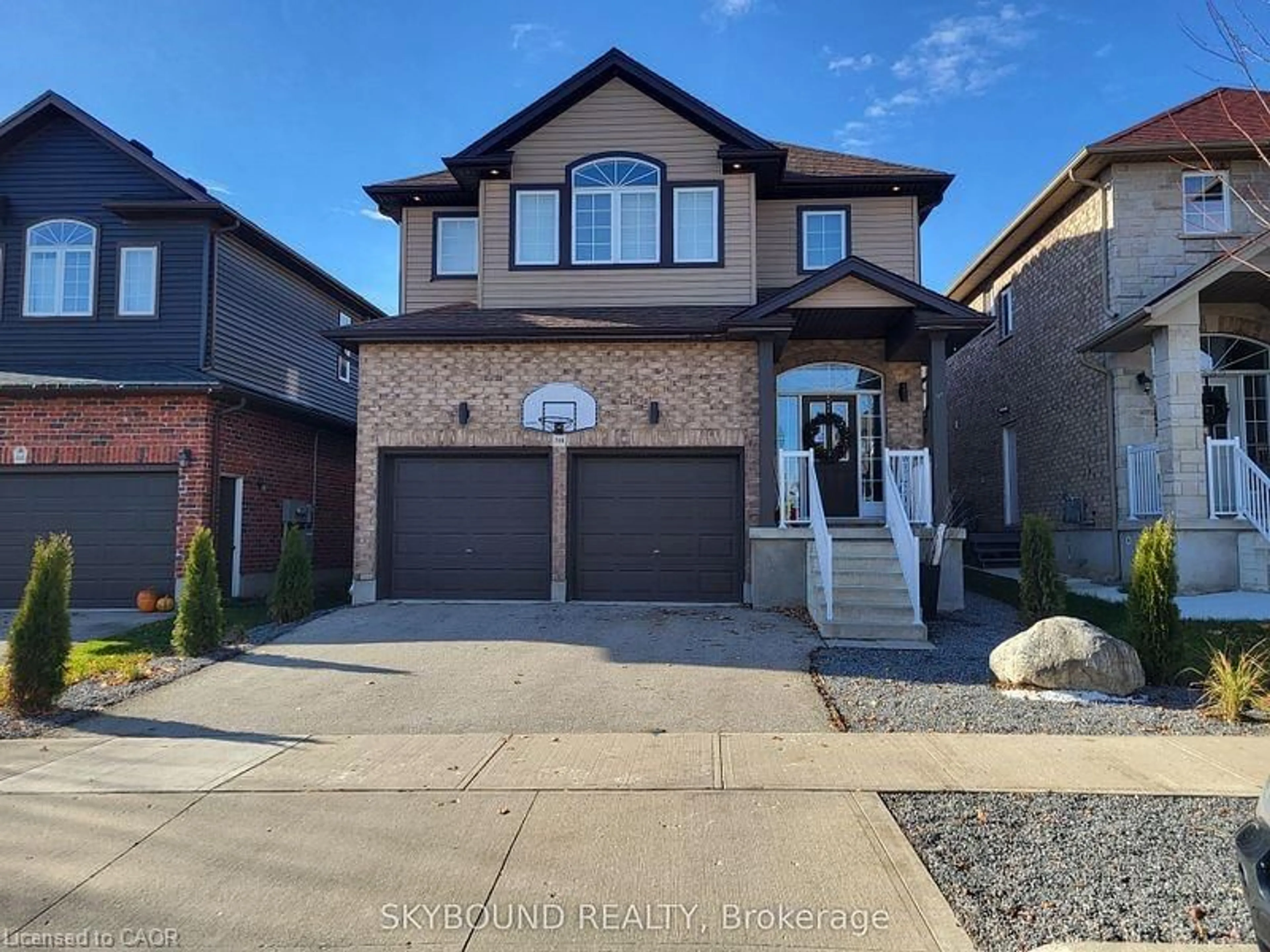 Home with brick exterior material, street for 344 Watervale Cres, Kitchener Ontario N2A 0G1