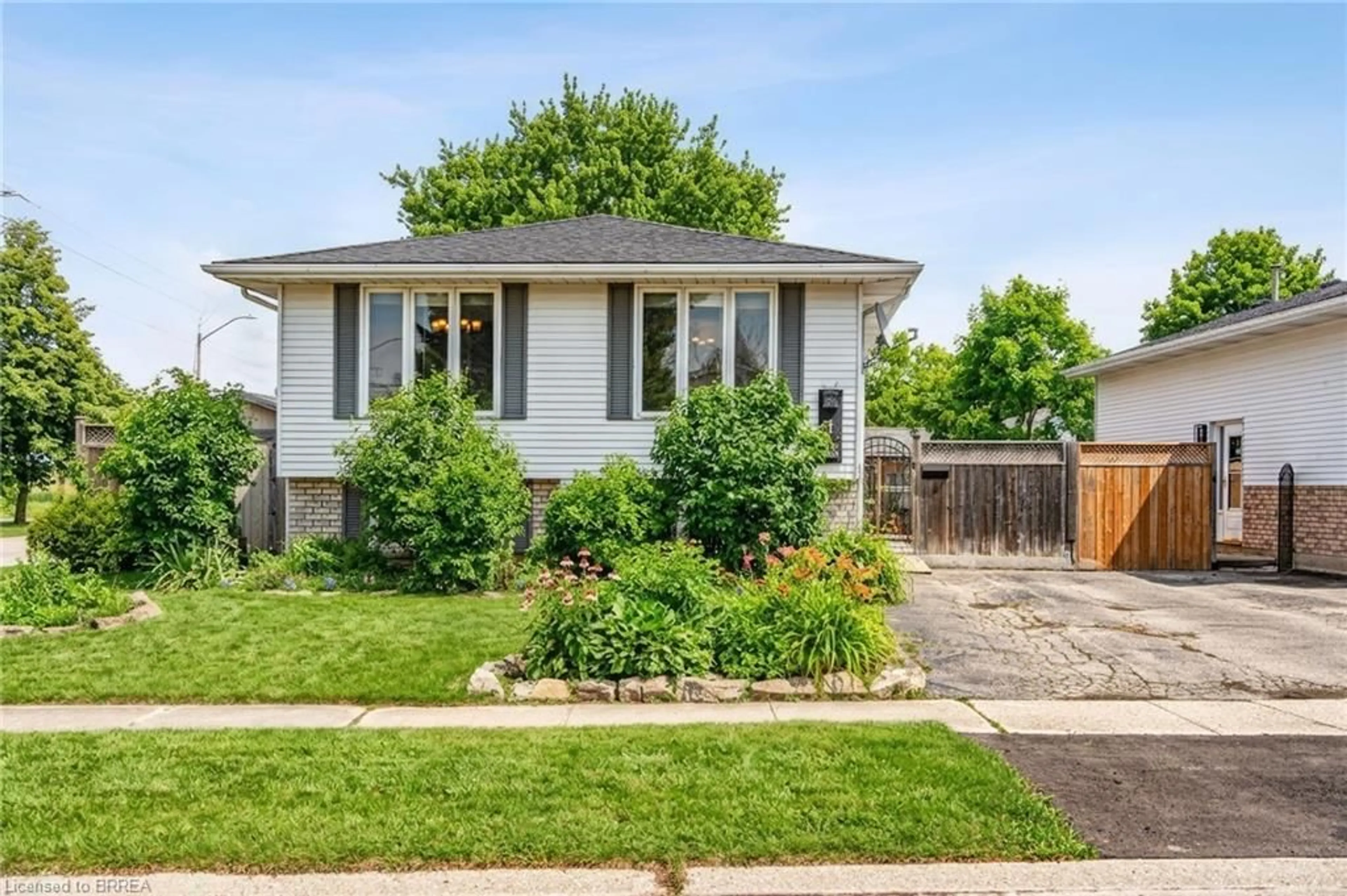 Home with brick exterior material, street for 1 Osijek Cres, Brantford Ontario N3P 1Z3