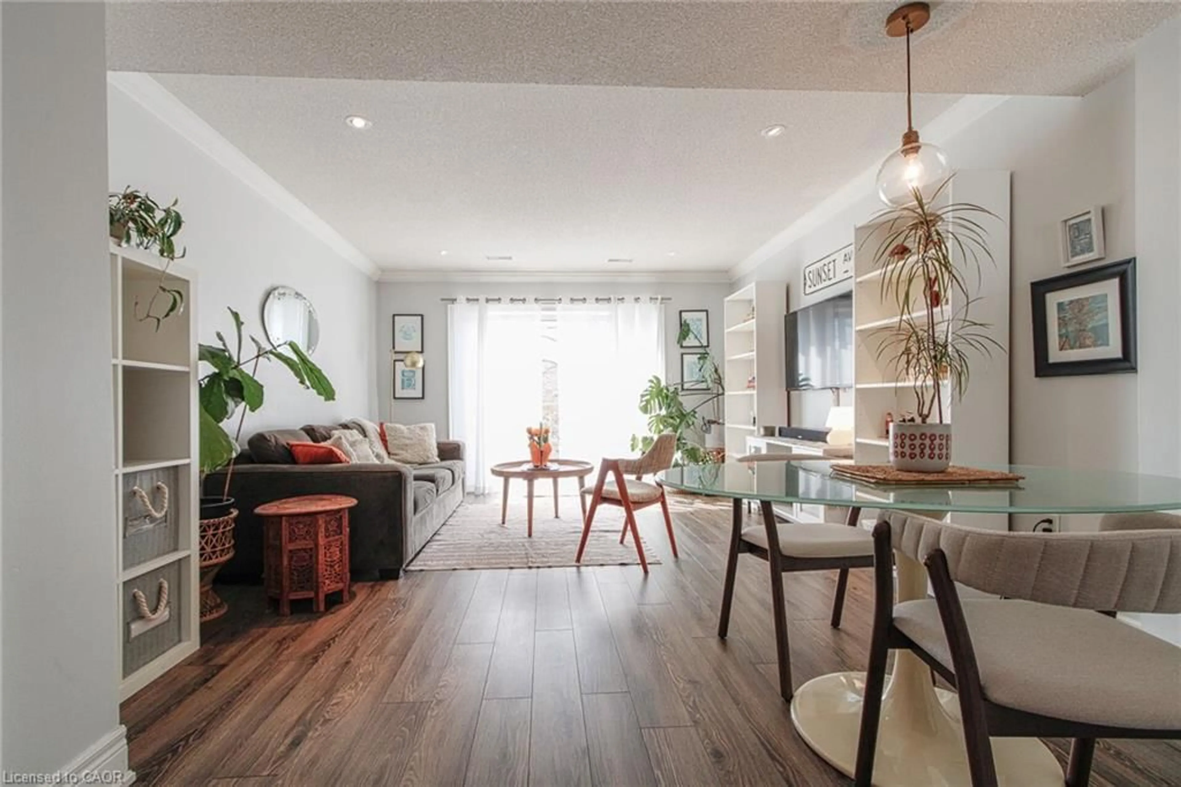 Living room with furniture, wood/laminate floor for 4045 Upper Middle Rd #12, Burlington Ontario L7M 4S8