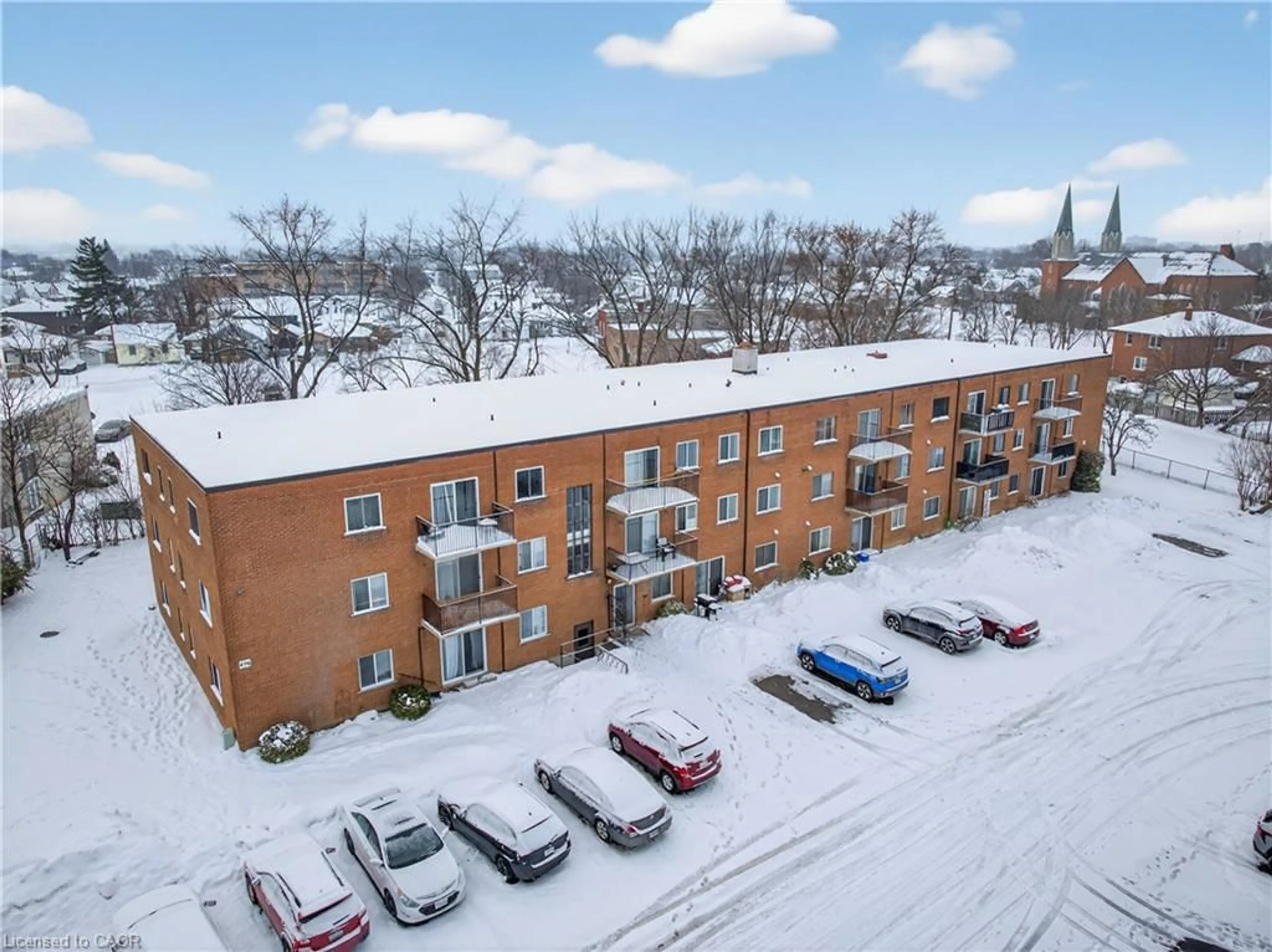 A pic from outside/outdoor area/front of a property/back of a property/a pic from drone, unknown for 456 Carlton St #10, St. Catharines Ontario L2M 4X1