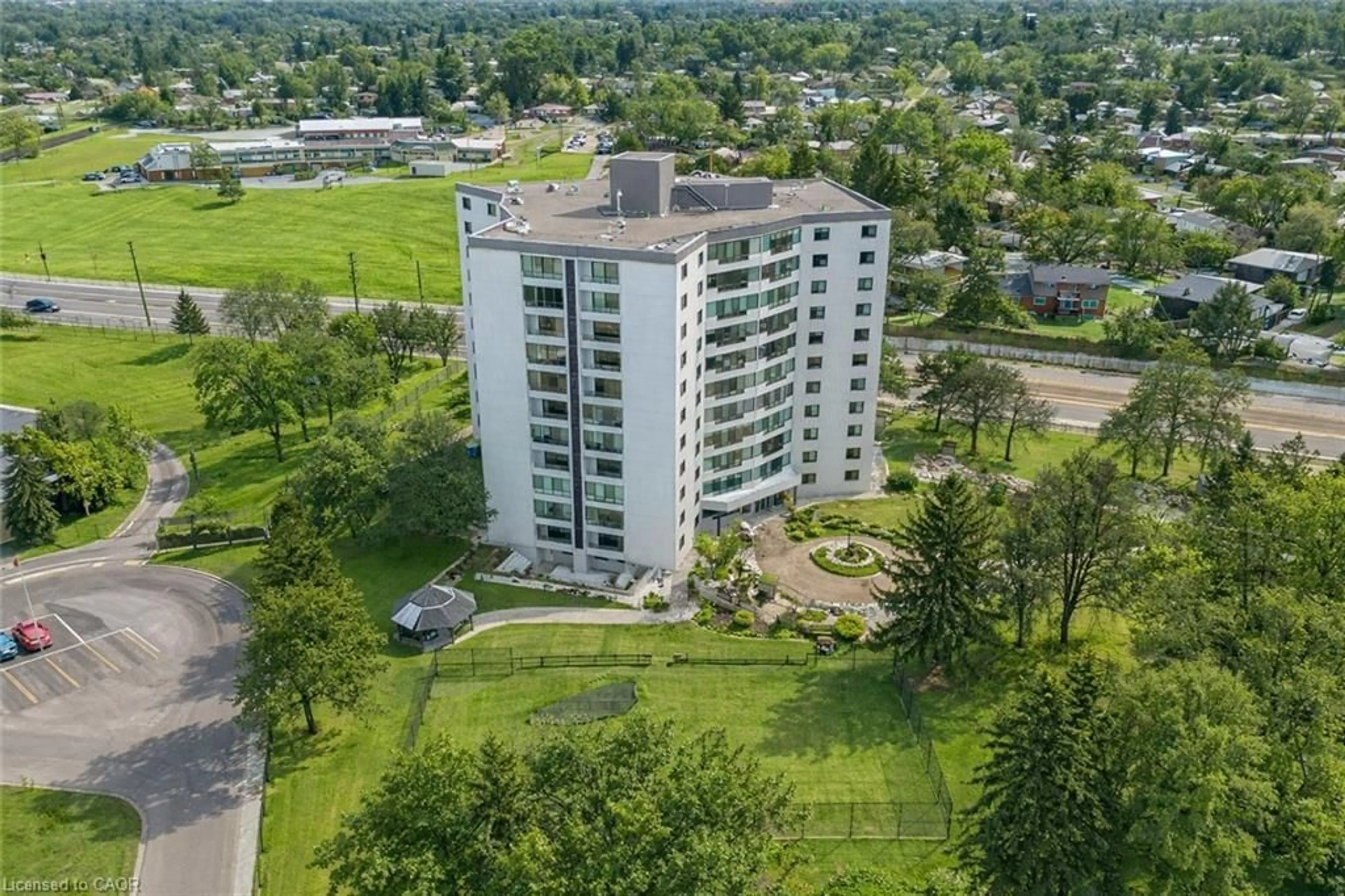 A pic from outside/outdoor area/front of a property/back of a property/a pic from drone, unknown for 250 Glenridge Dr #102, Waterloo Ontario N2J 4H8