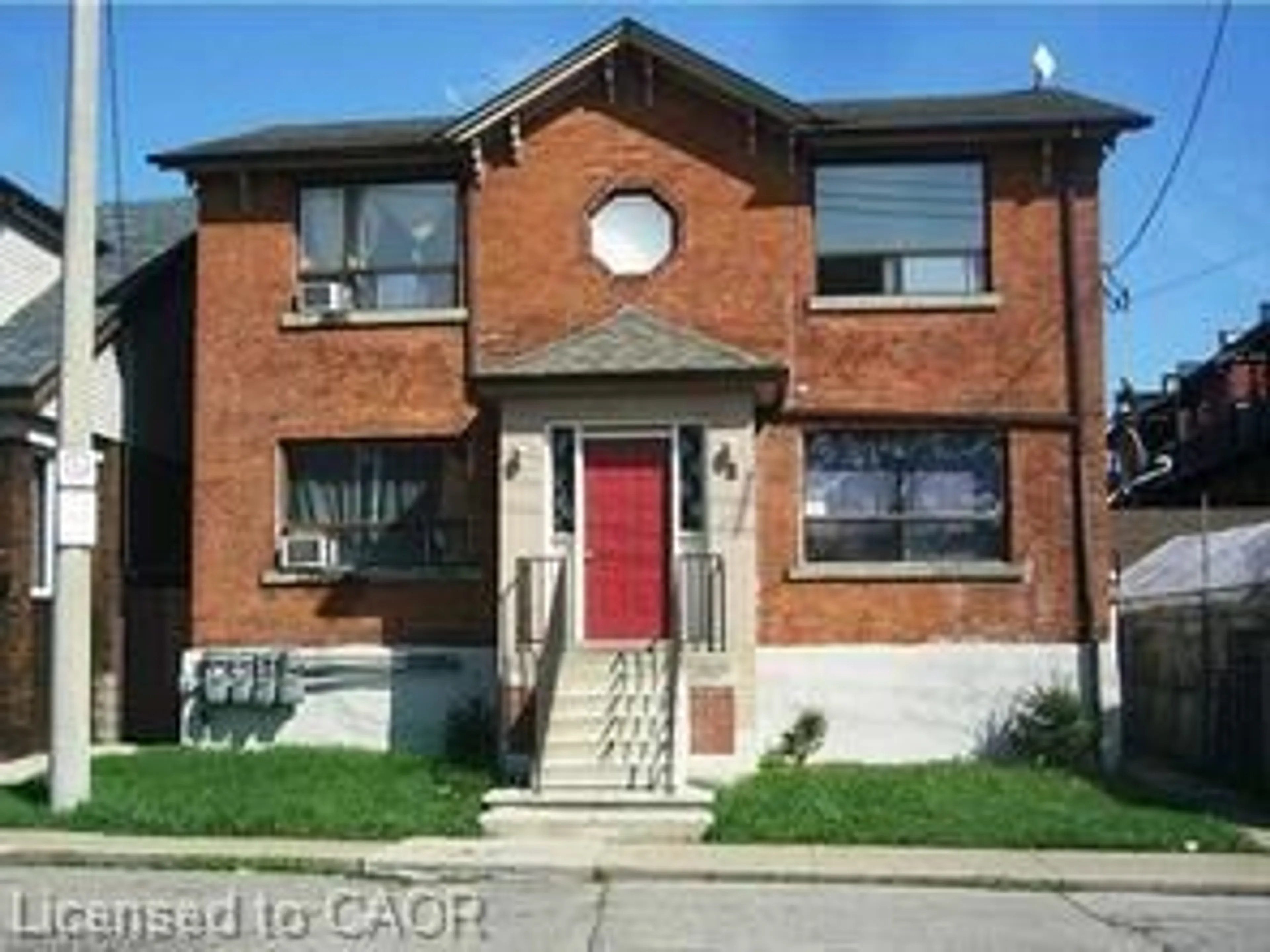 Home with brick exterior material, street for 8 St. Matthews Ave, Hamilton Ontario L8L 5P3