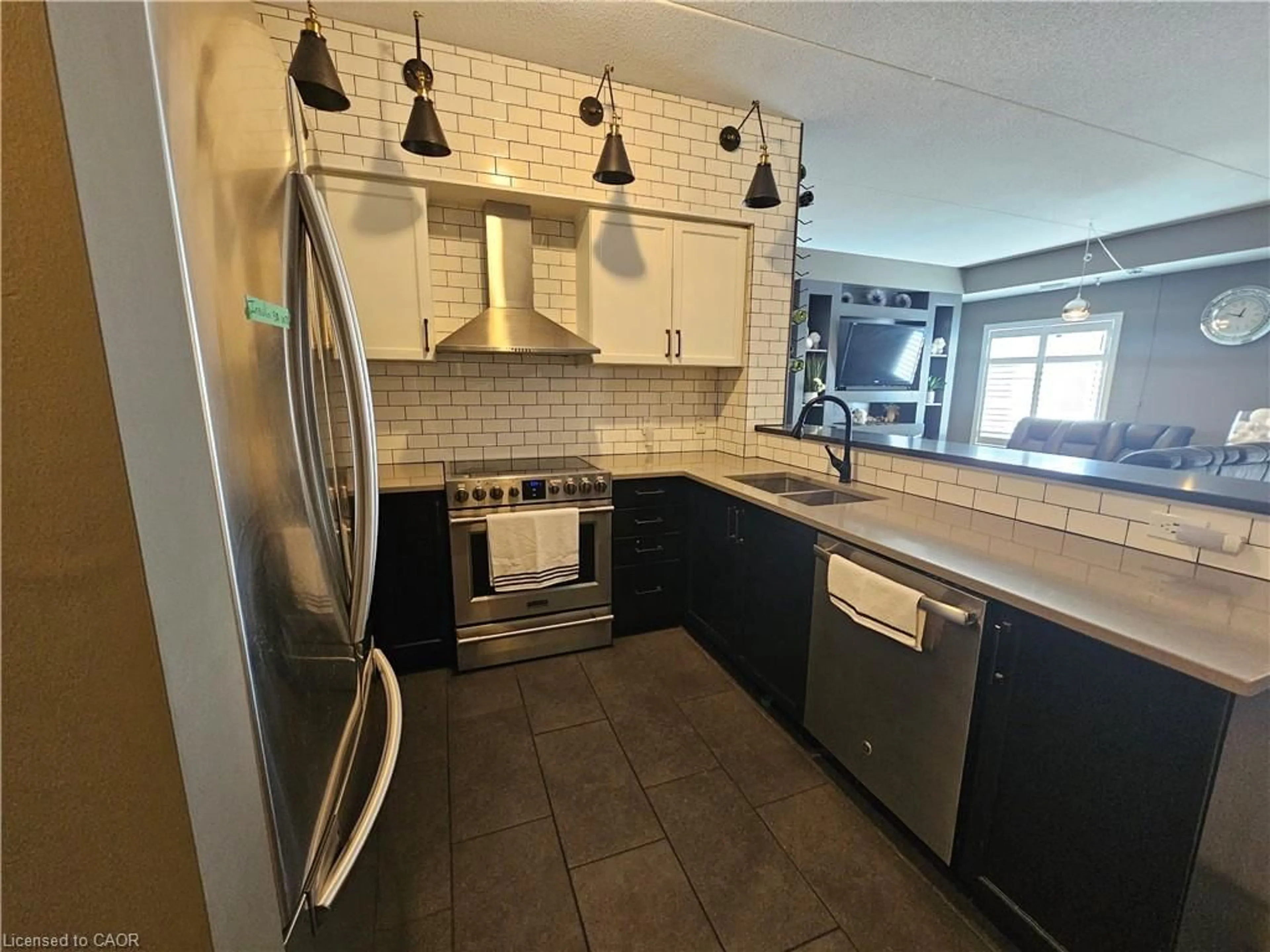 Open concept kitchen, ceramic/tile floor for 308 Watson Pky #102, Guelph Ontario N1E 0G7
