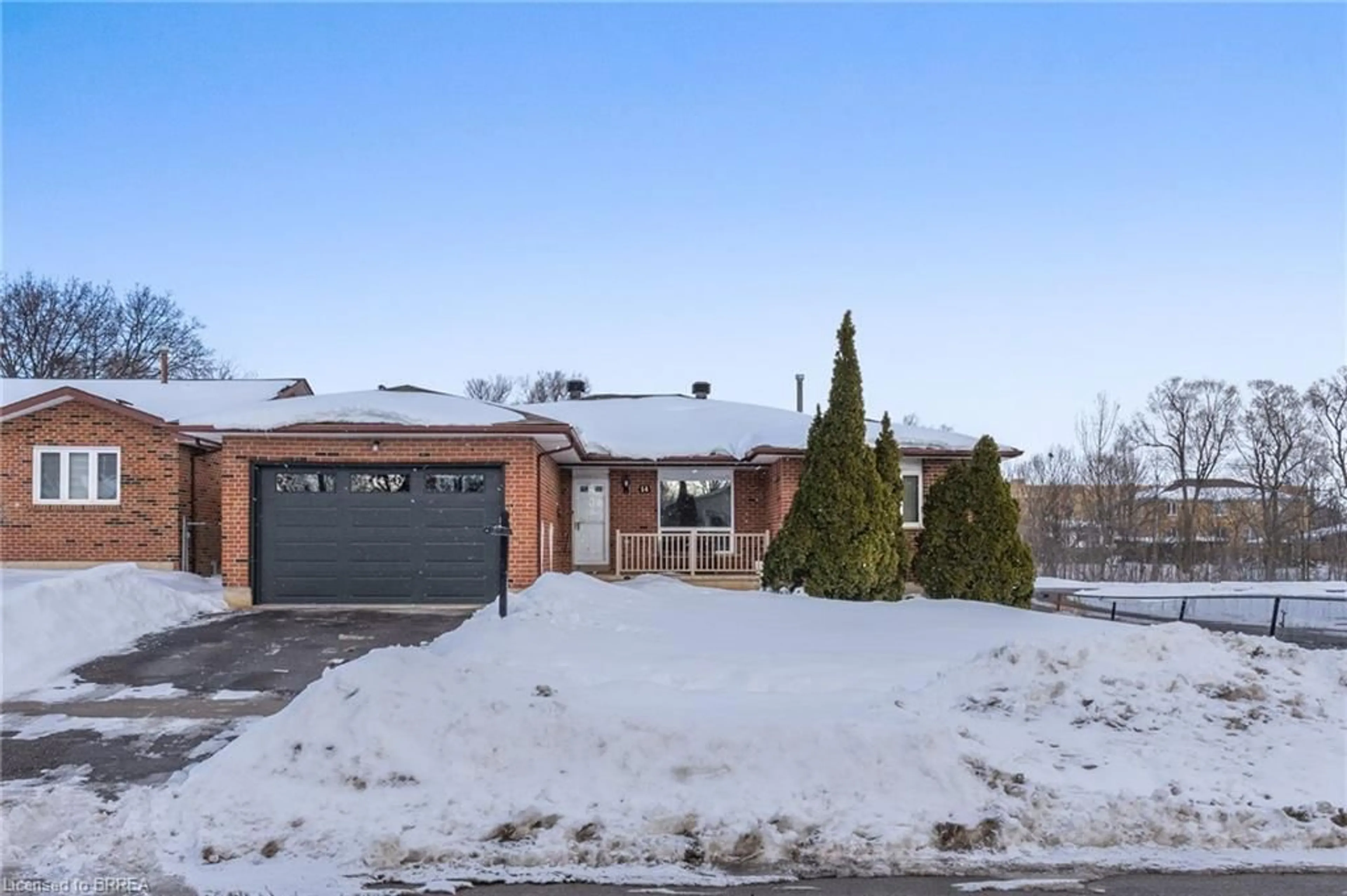 Home with brick exterior material, street for 14 Brookland Dr, Brampton Ontario L6T 2M5