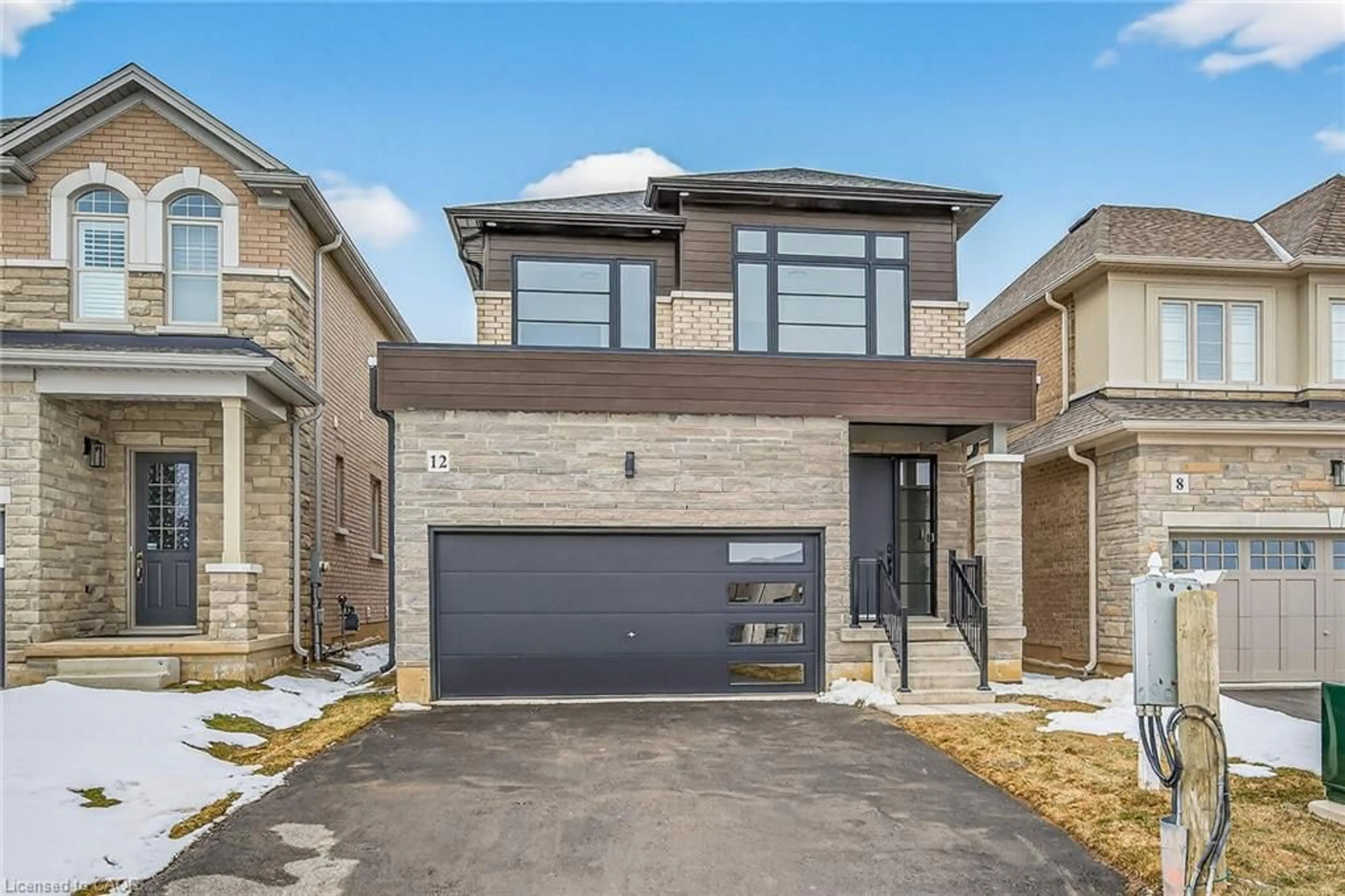 Home with brick exterior material, street for 12 Shady Oaks Trail, Hamilton Ontario L9B 0E9