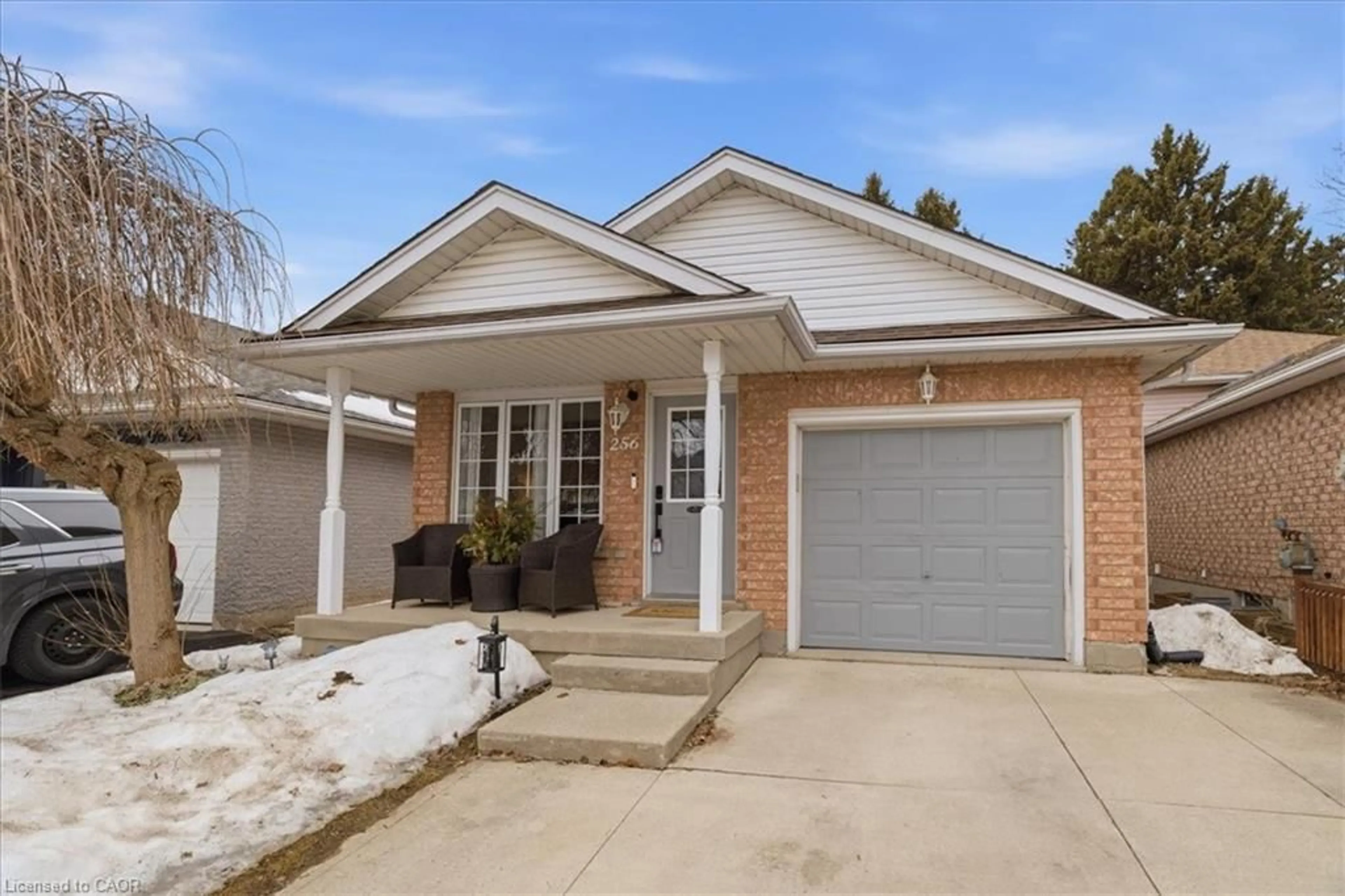 Home with brick exterior material, street for 256 Grey Fox Dr, Kitchener Ontario N2E 3N4