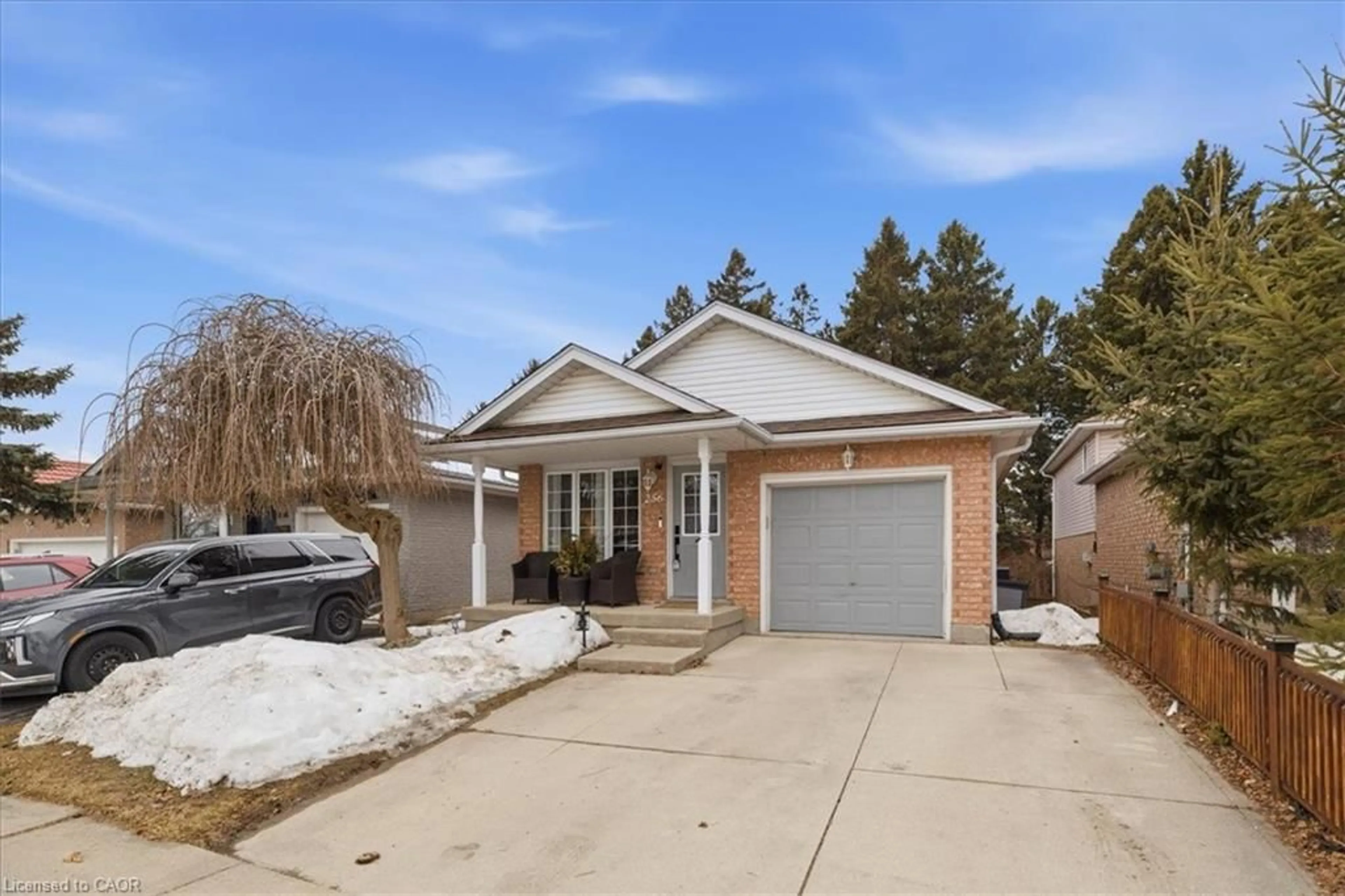 Home with brick exterior material, street for 256 Grey Fox Dr, Kitchener Ontario N2E 3N4