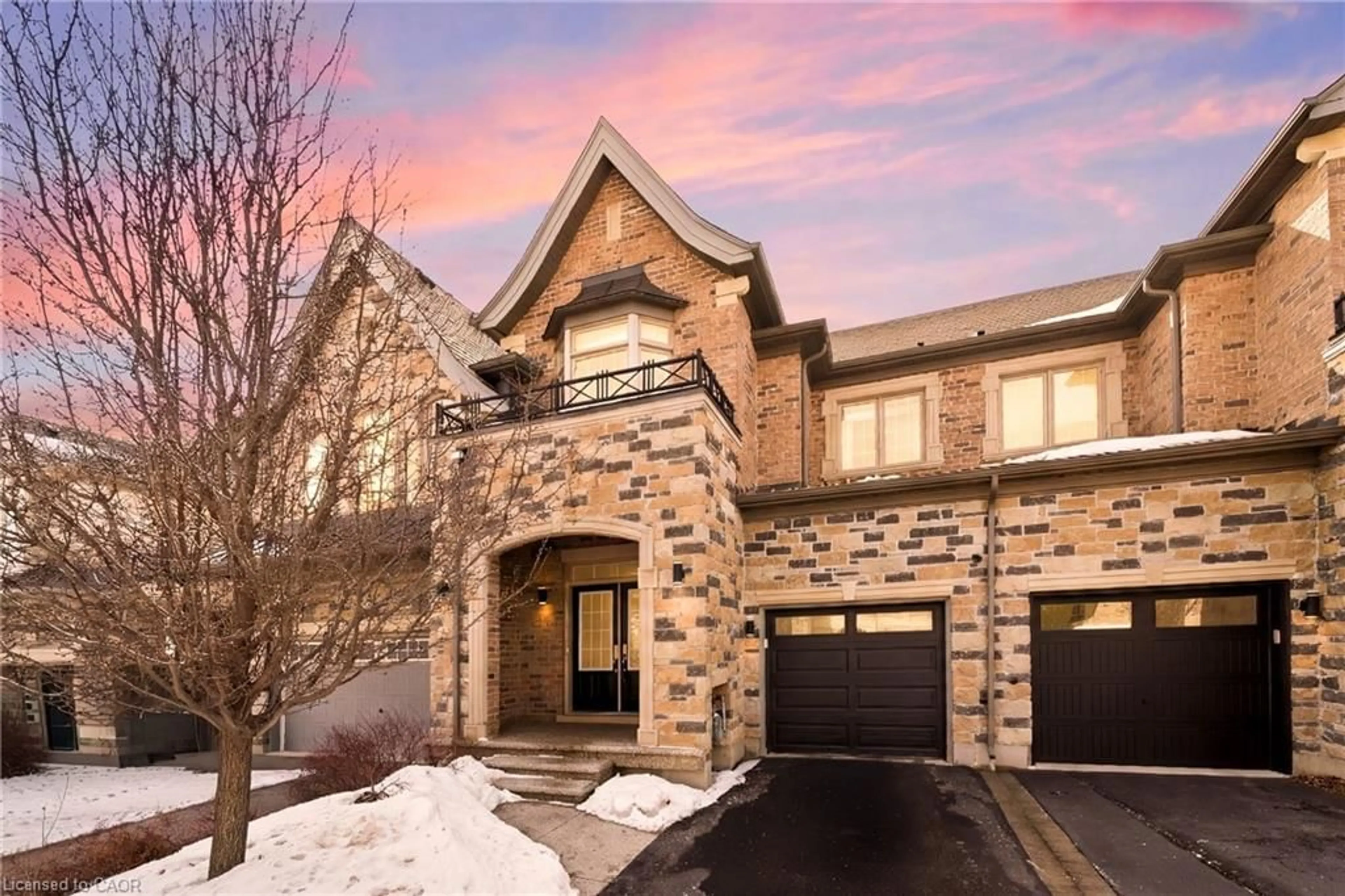 Home with brick exterior material, street for 2466 Village Common, Oakville Ontario L6M 0S2