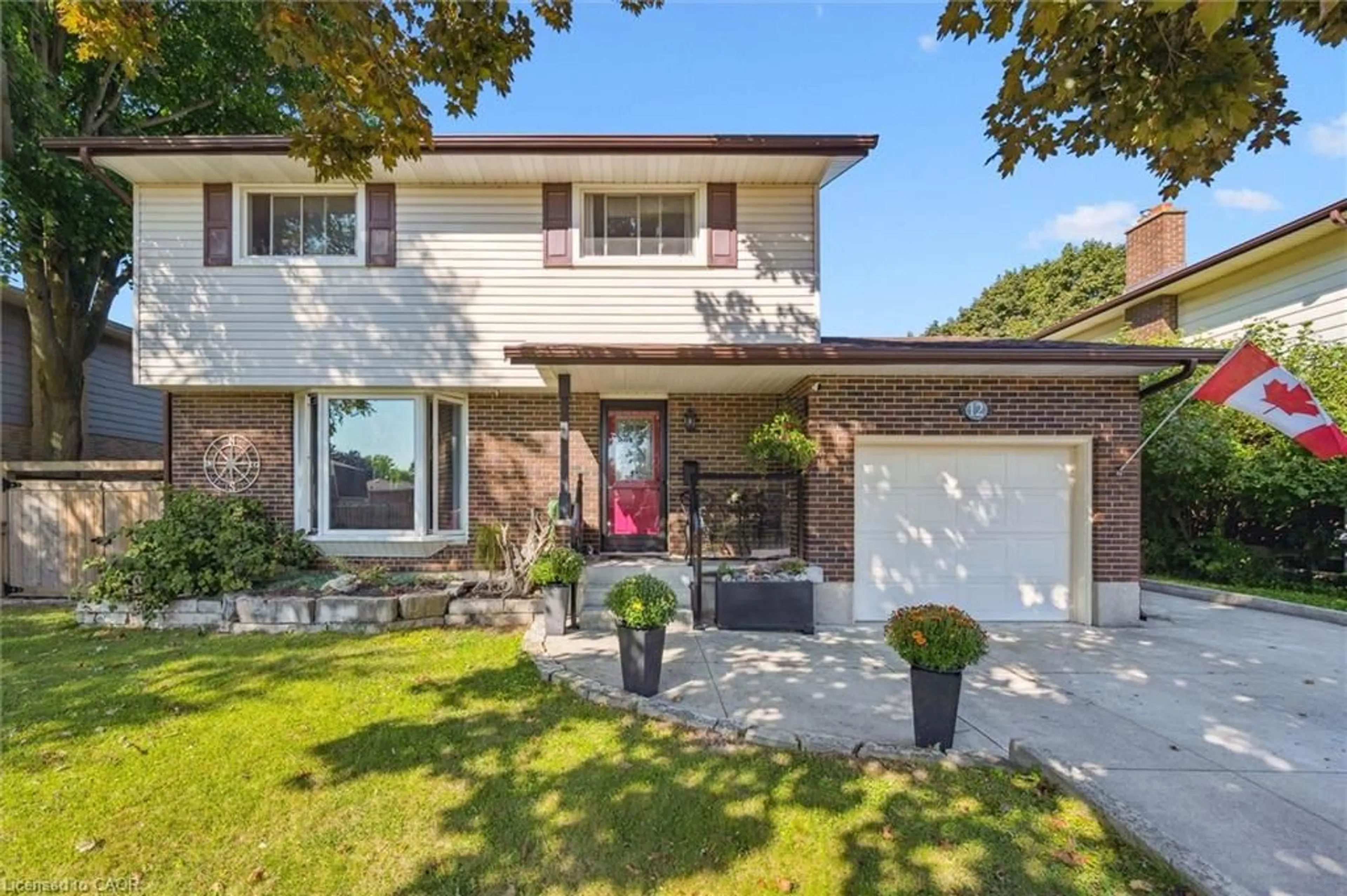 Home with brick exterior material, street for 12 Westbury Cres, Cambridge Ontario N3C 3G2