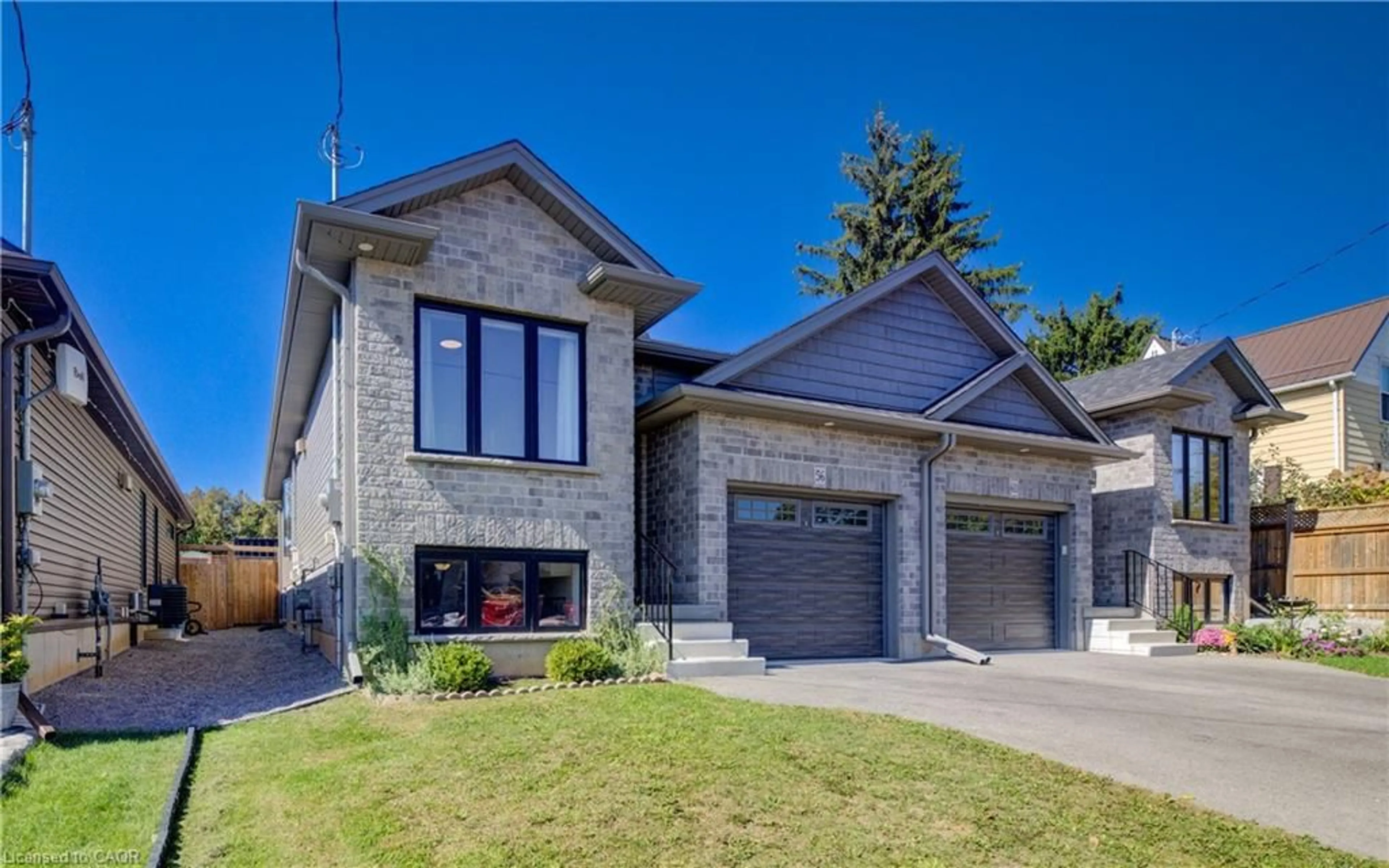 Home with brick exterior material, street for 56 Norfolk St, Waterford Ontario N0E 1Y0