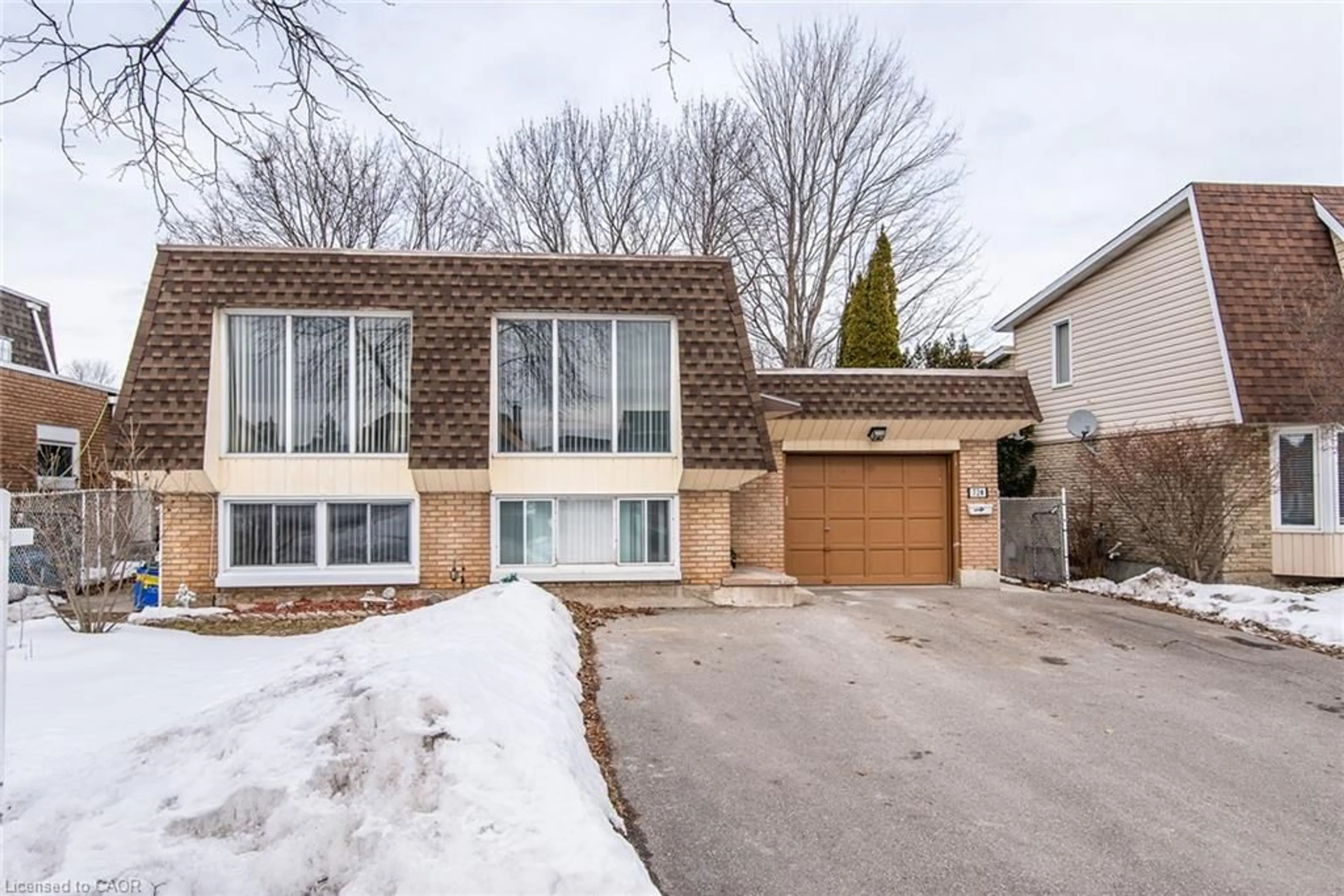 Home with brick exterior material, street for 72 Manor Dr, Kitchener Ontario N2A 2V1