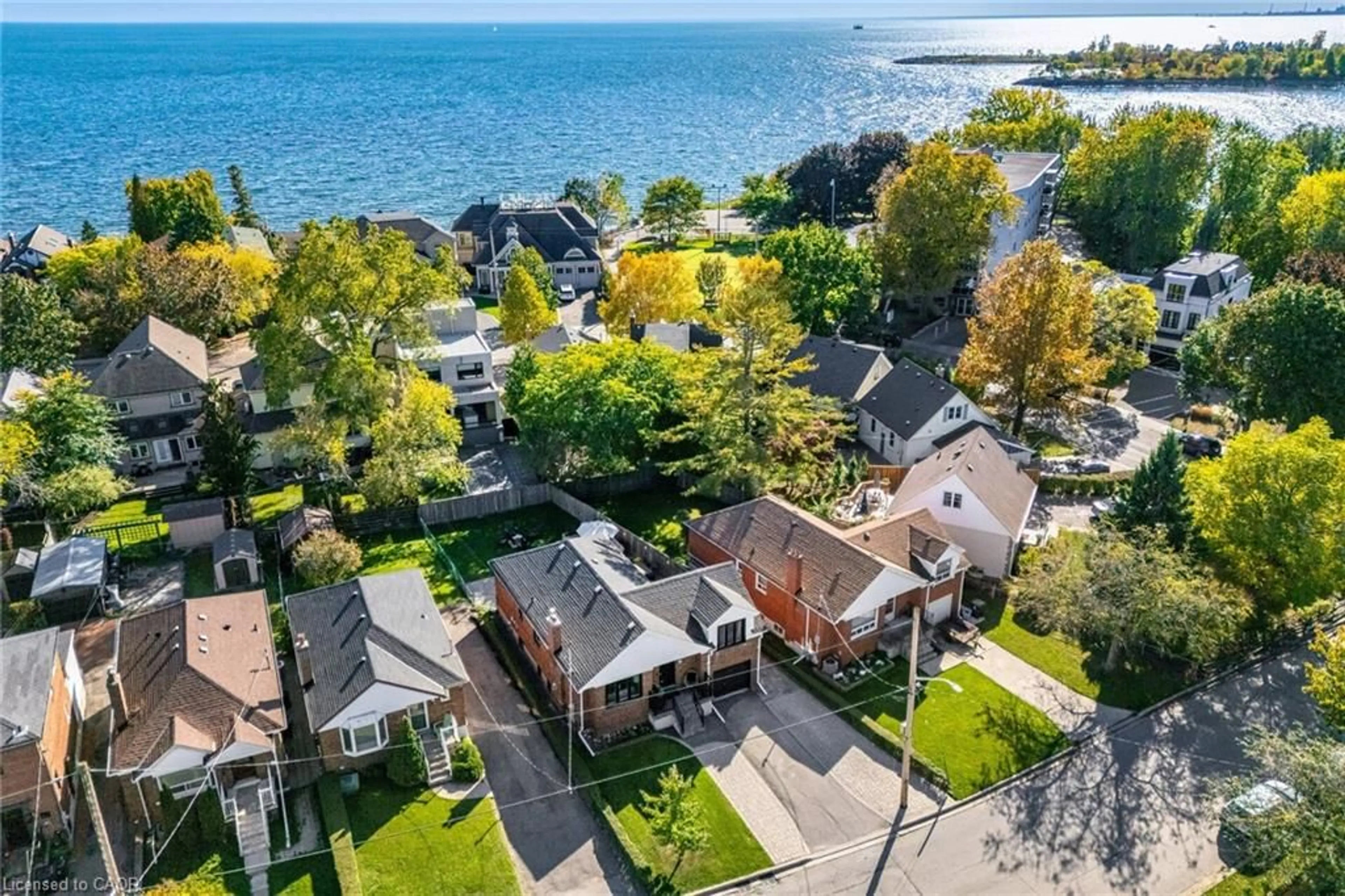 A pic from outside/outdoor area/front of a property/back of a property/a pic from drone, water/lake/river/ocean view for 75 Emerald Cres, Toronto Ontario M8V 2B5
