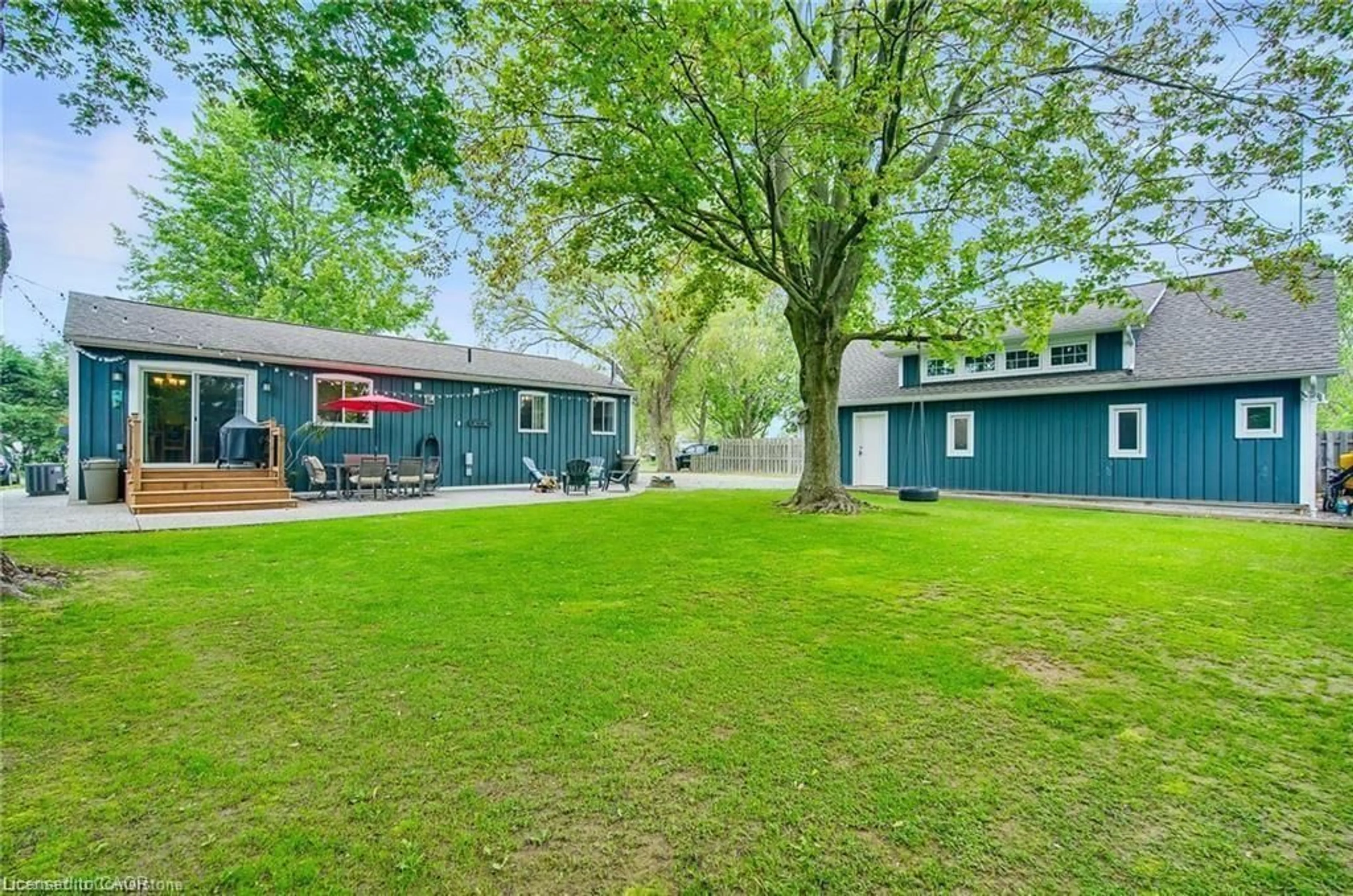 A pic from outside/outdoor area/front of a property/back of a property/a pic from drone, water/lake/river/ocean view for 8 Beach Rd, Lowbanks Ontario N0A 1K0
