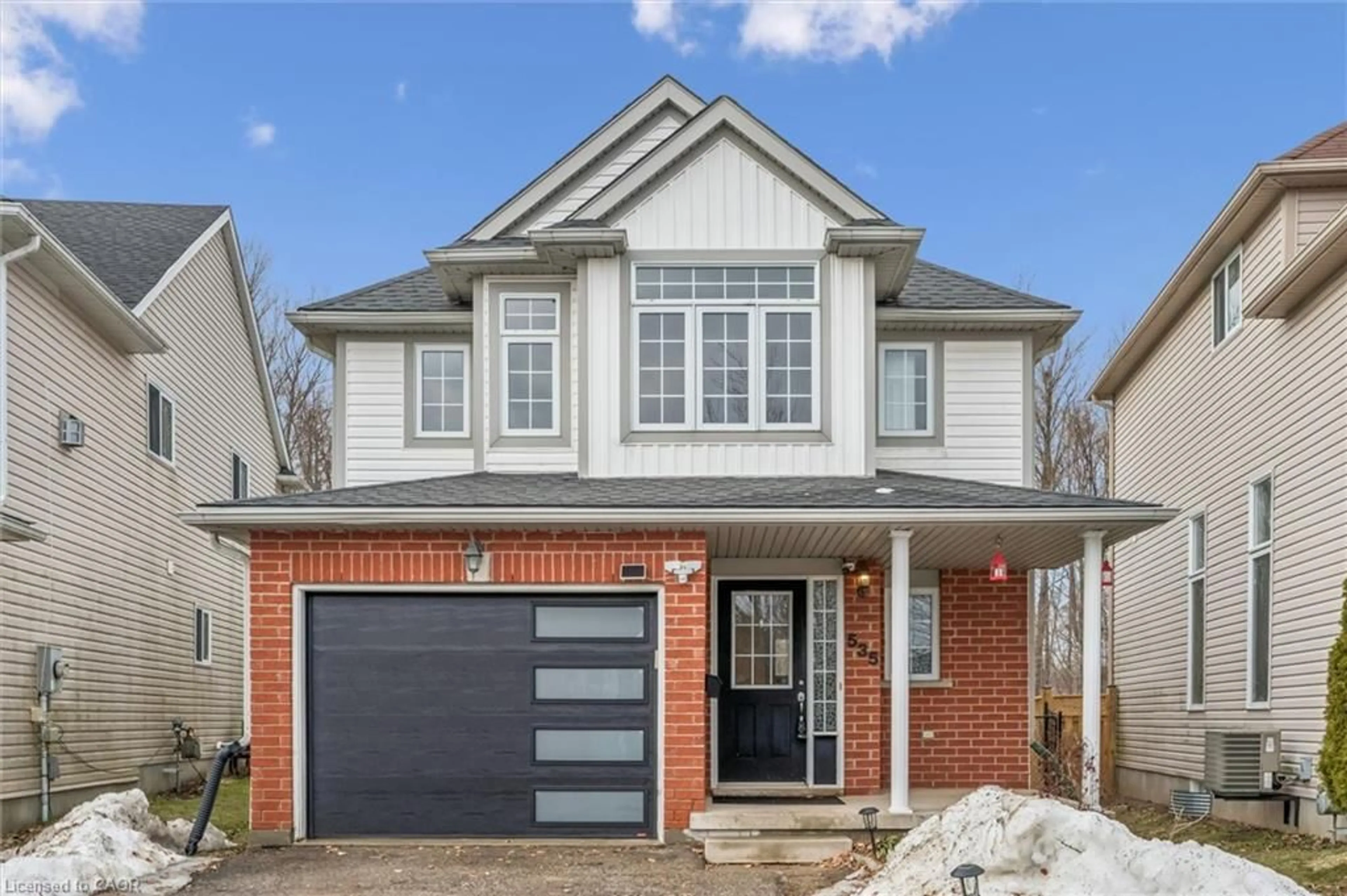 Home with brick exterior material, street for 535 Blue Beech Blvd, Waterloo Ontario N2V 2T4