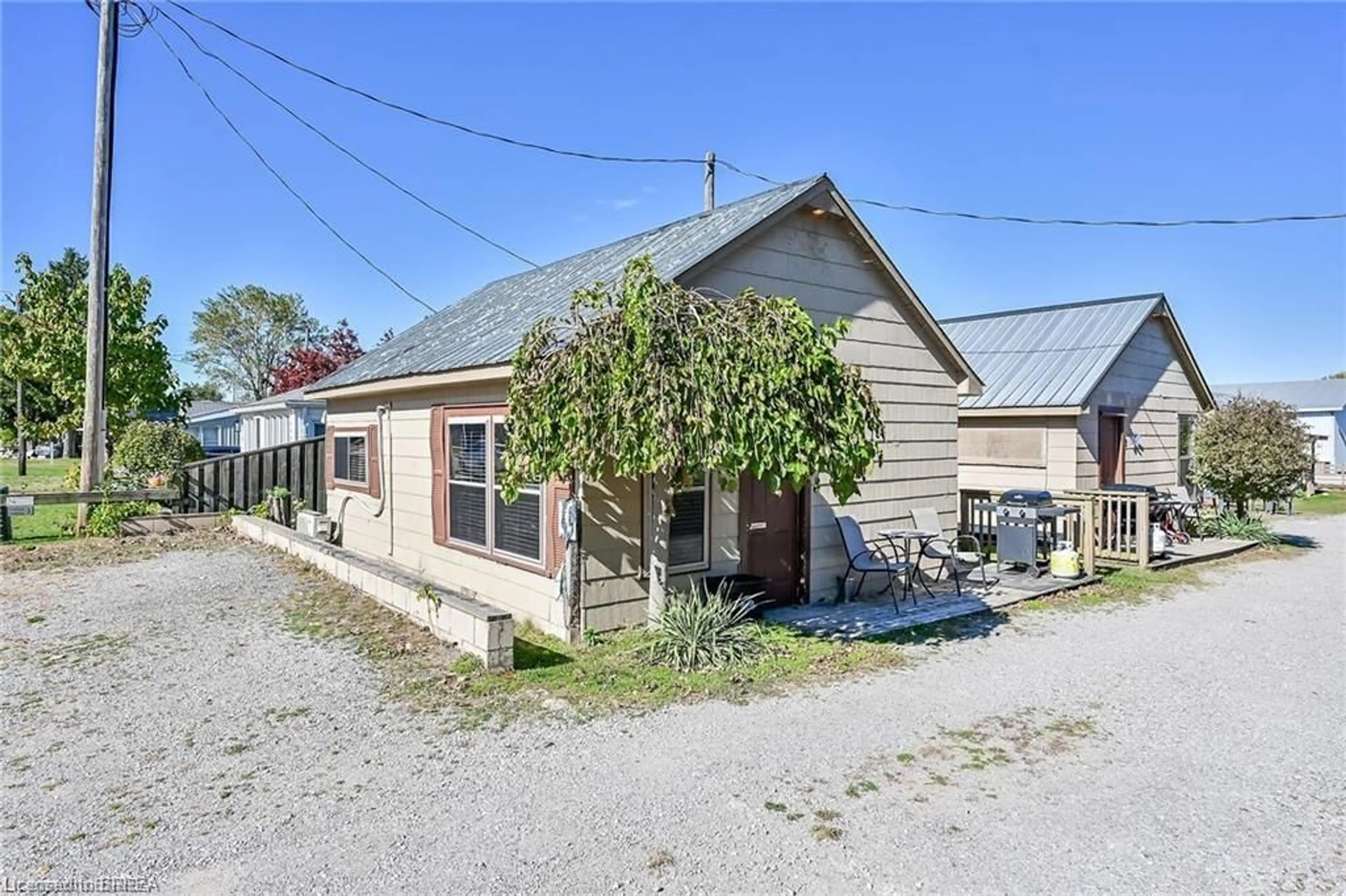 A pic from outside/outdoor area/front of a property/back of a property/a pic from drone, street for 48-50 Erie Blvd, Long Point Ontario N0E 1M0