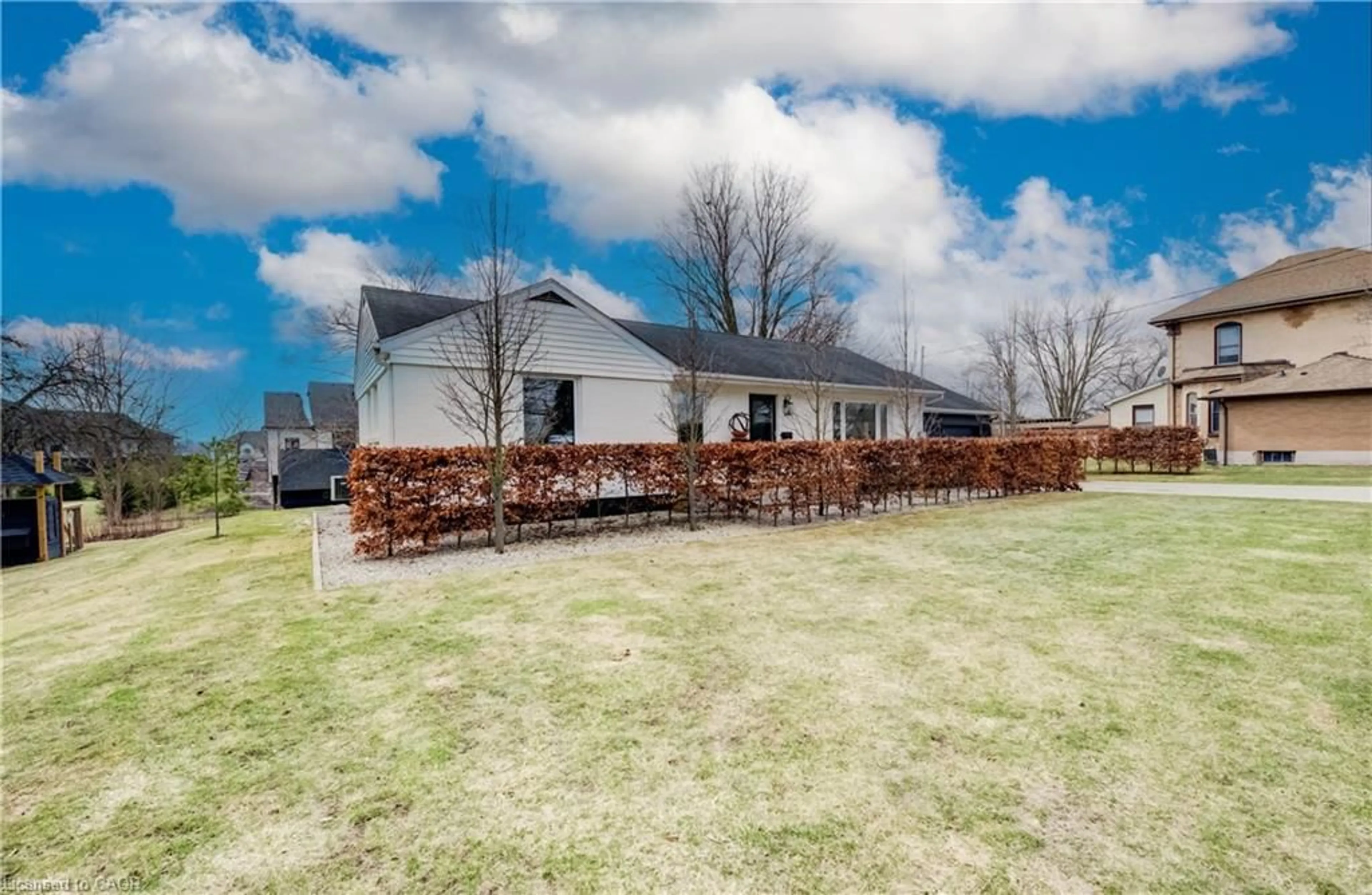 A pic from outside/outdoor area/front of a property/back of a property/a pic from drone, unknown for 50 Main St, Norwich Ontario N0J 1P0