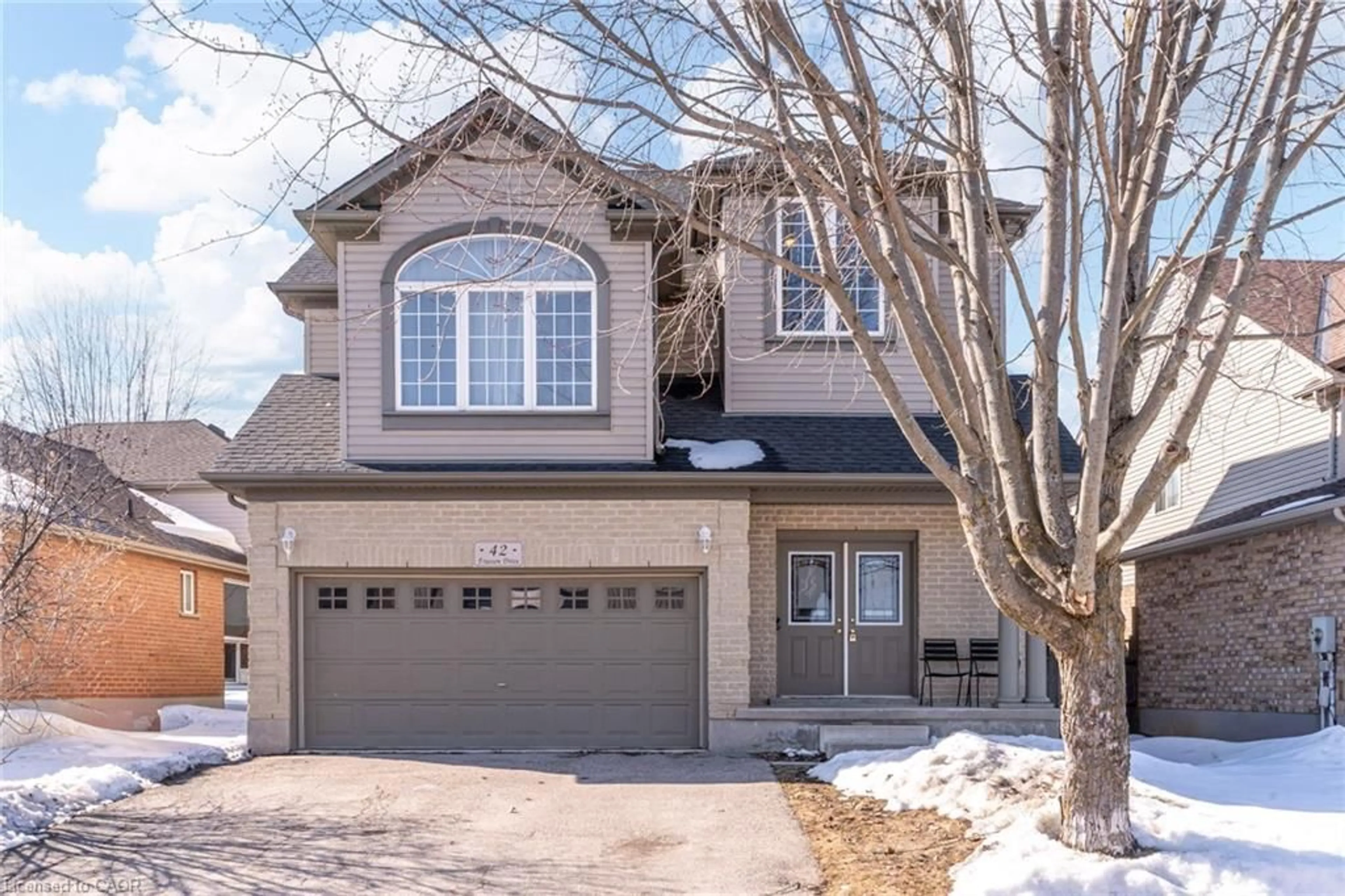 Home with brick exterior material, street for 42 Frasson Dr, Guelph Ontario N1E 7J9