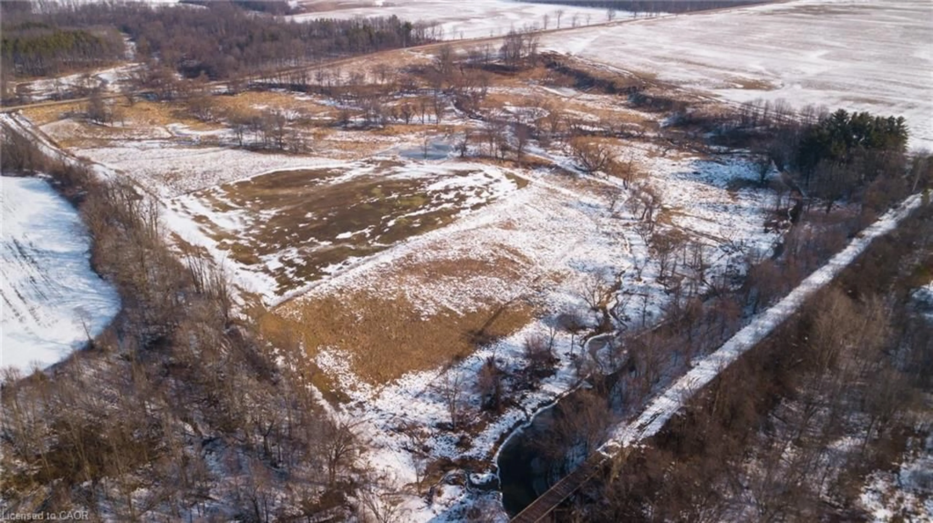 A pic from outside/outdoor area/front of a property/back of a property/a pic from drone, unknown for 1448 Concession 14, Simcoe Ontario N3Y 4K3